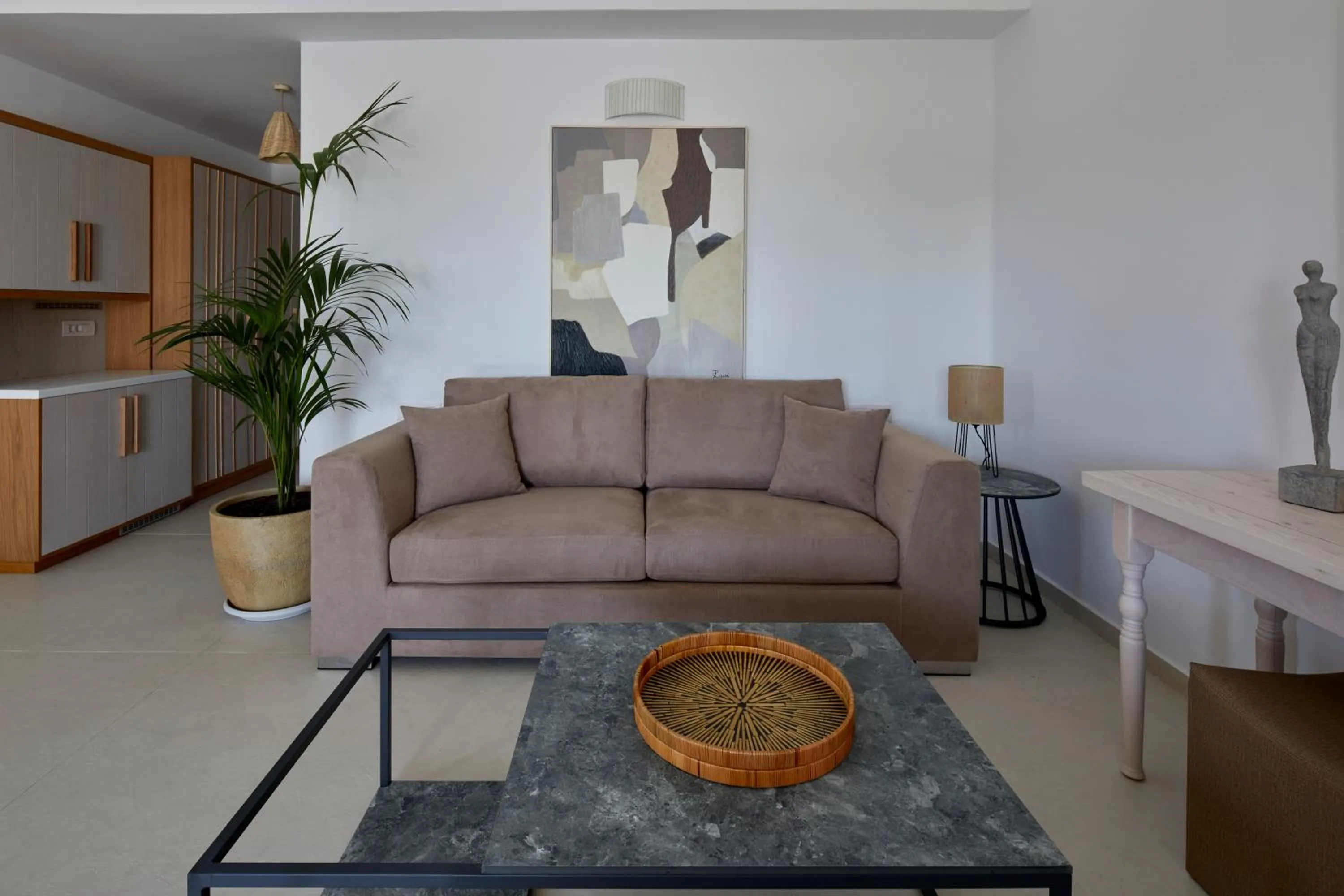 Living room in Sea Breeze Santorini Beach Resort, Curio By Hilton