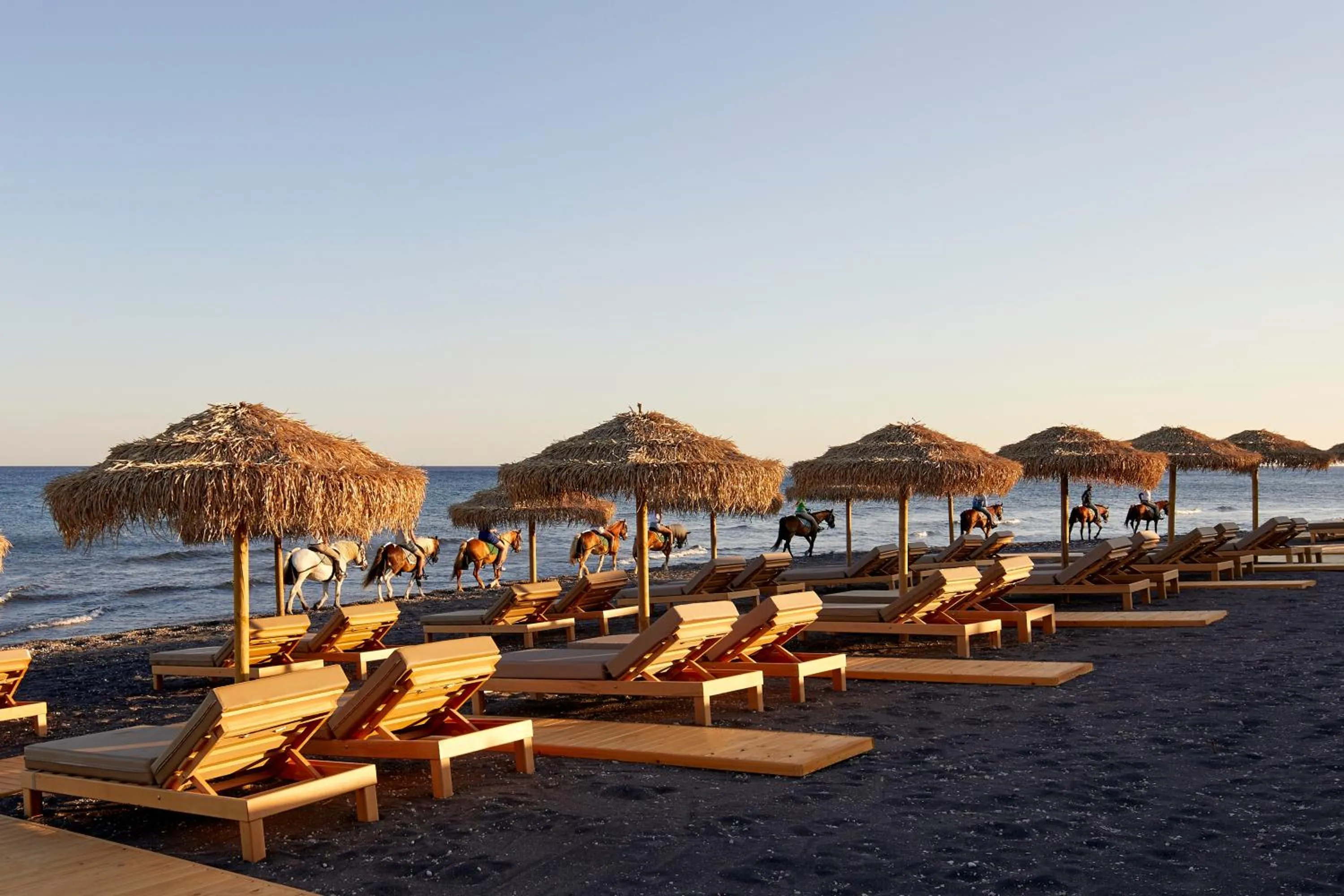 Beach in Sea Breeze Santorini Beach Resort, Curio By Hilton