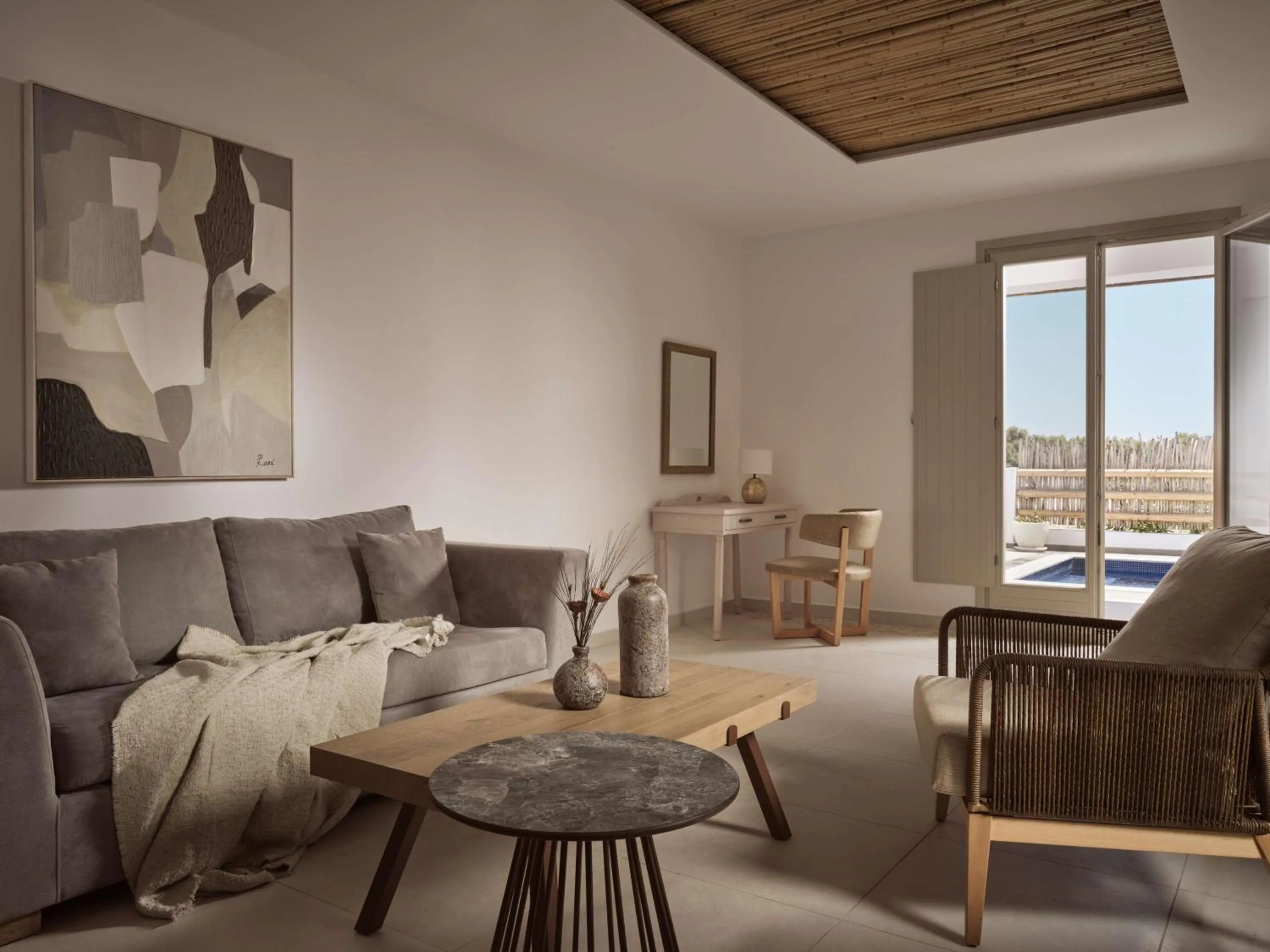 Living room in Sea Breeze Santorini Beach Resort, Curio By Hilton