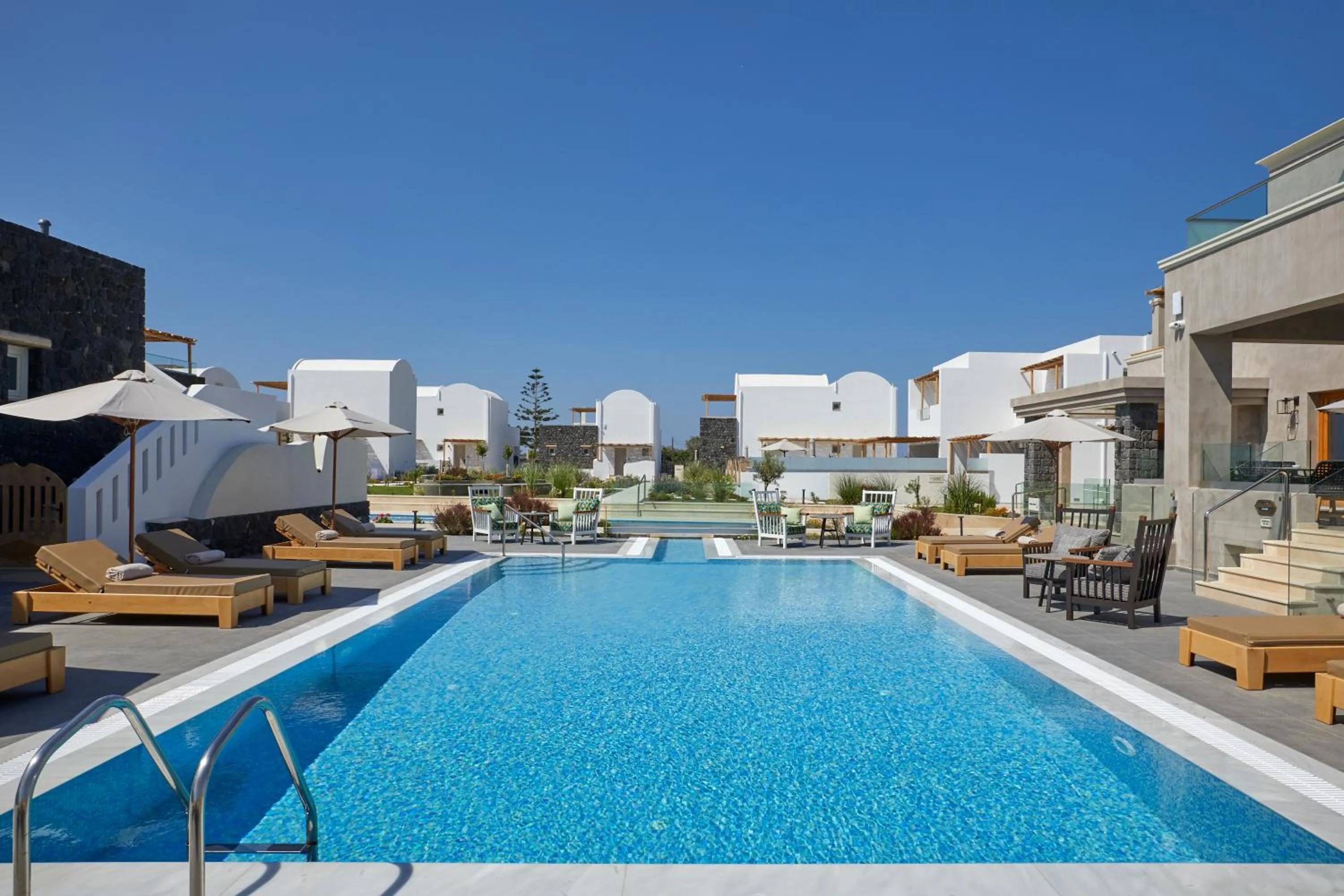 Property building in Sea Breeze Santorini Beach Resort, Curio By Hilton
