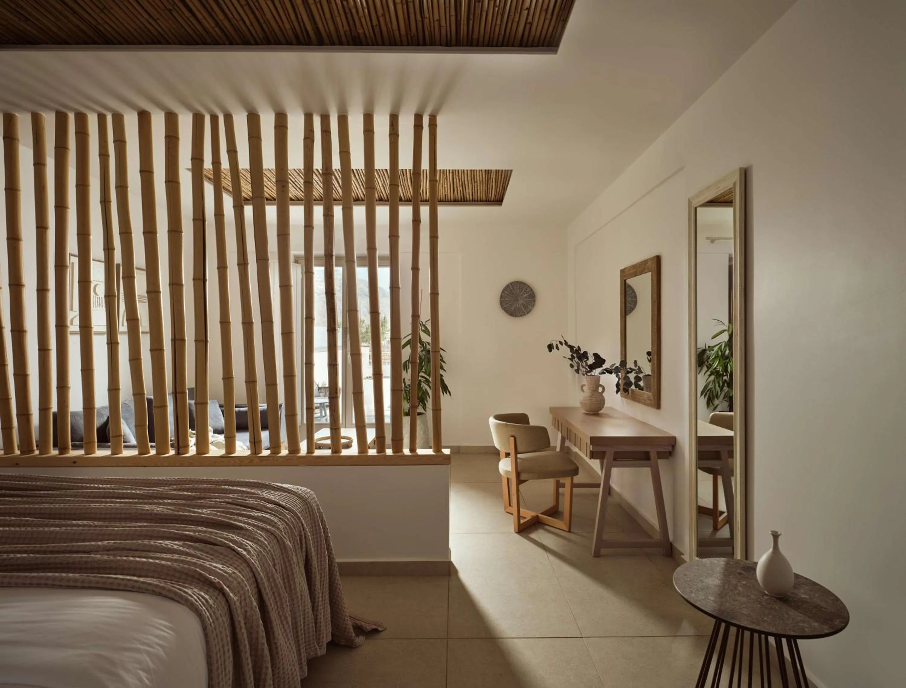 Bed in Sea Breeze Santorini Beach Resort, Curio By Hilton