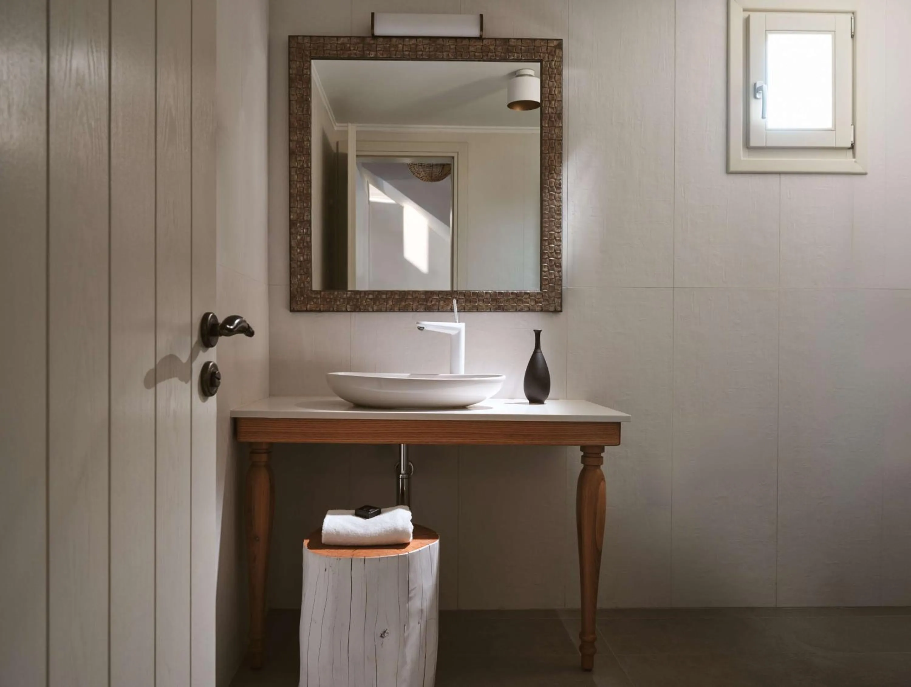 Bathroom in Sea Breeze Santorini Beach Resort, Curio By Hilton