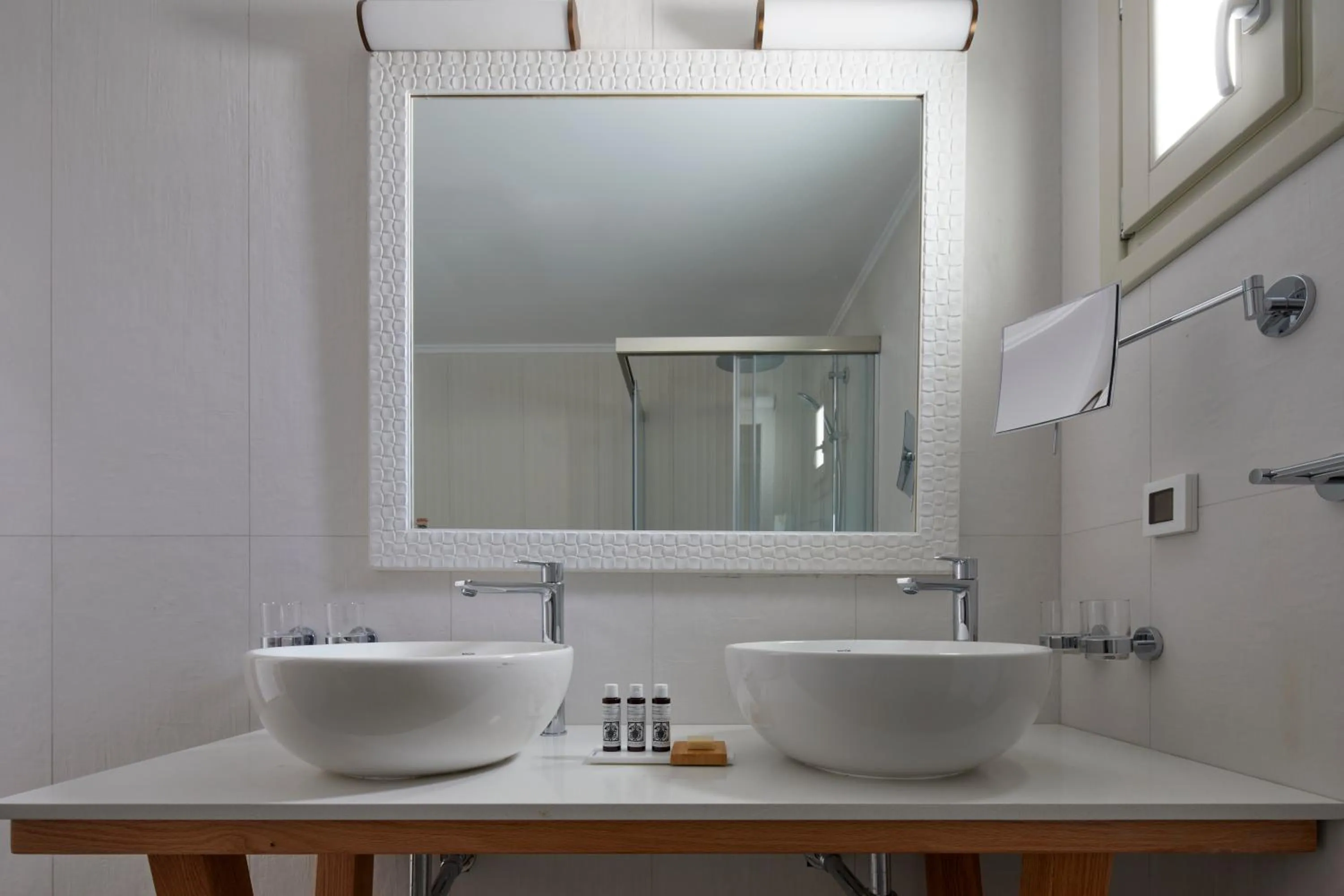 Bathroom in Sea Breeze Santorini Beach Resort, Curio By Hilton