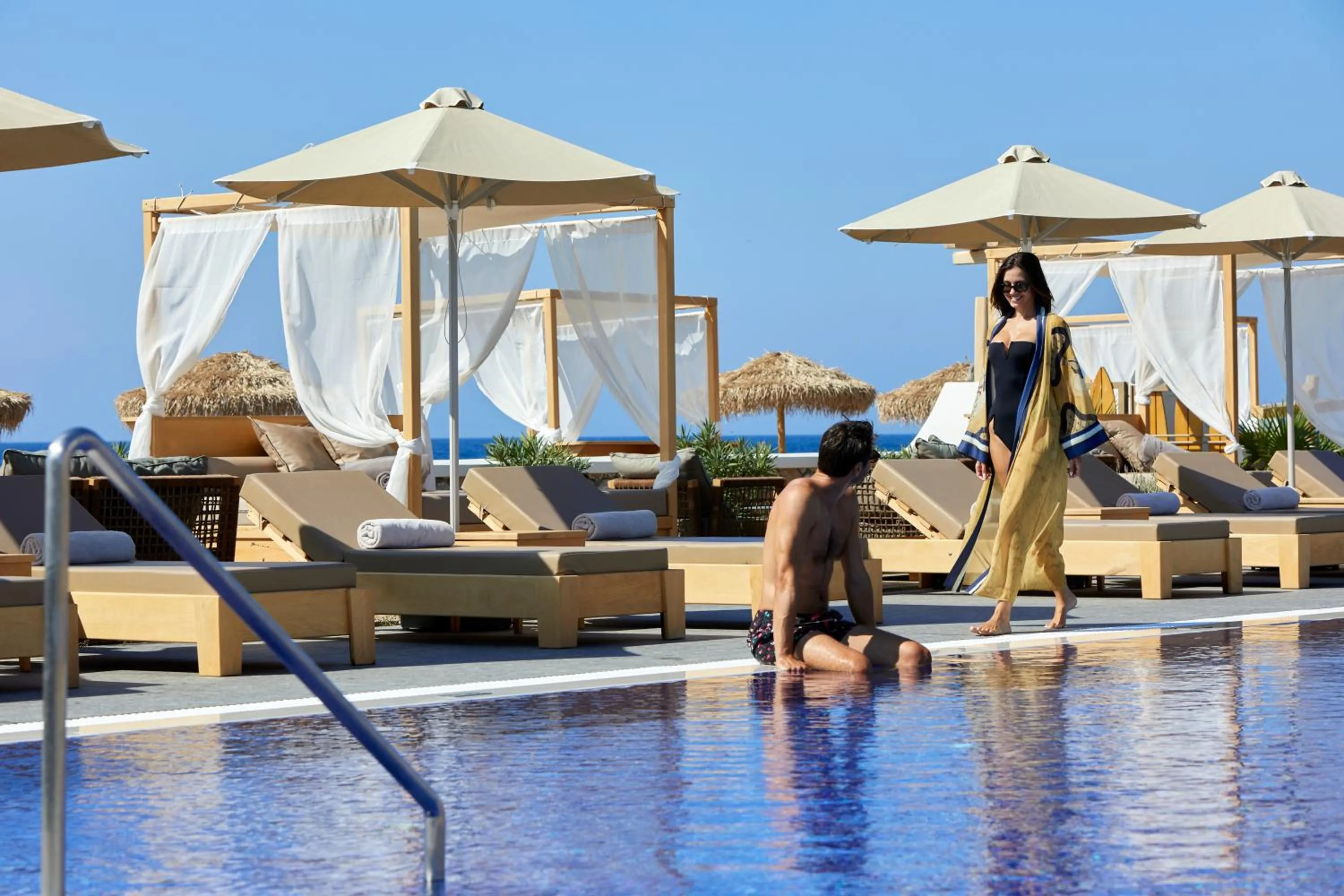 Swimming pool in Sea Breeze Santorini Beach Resort, Curio By Hilton