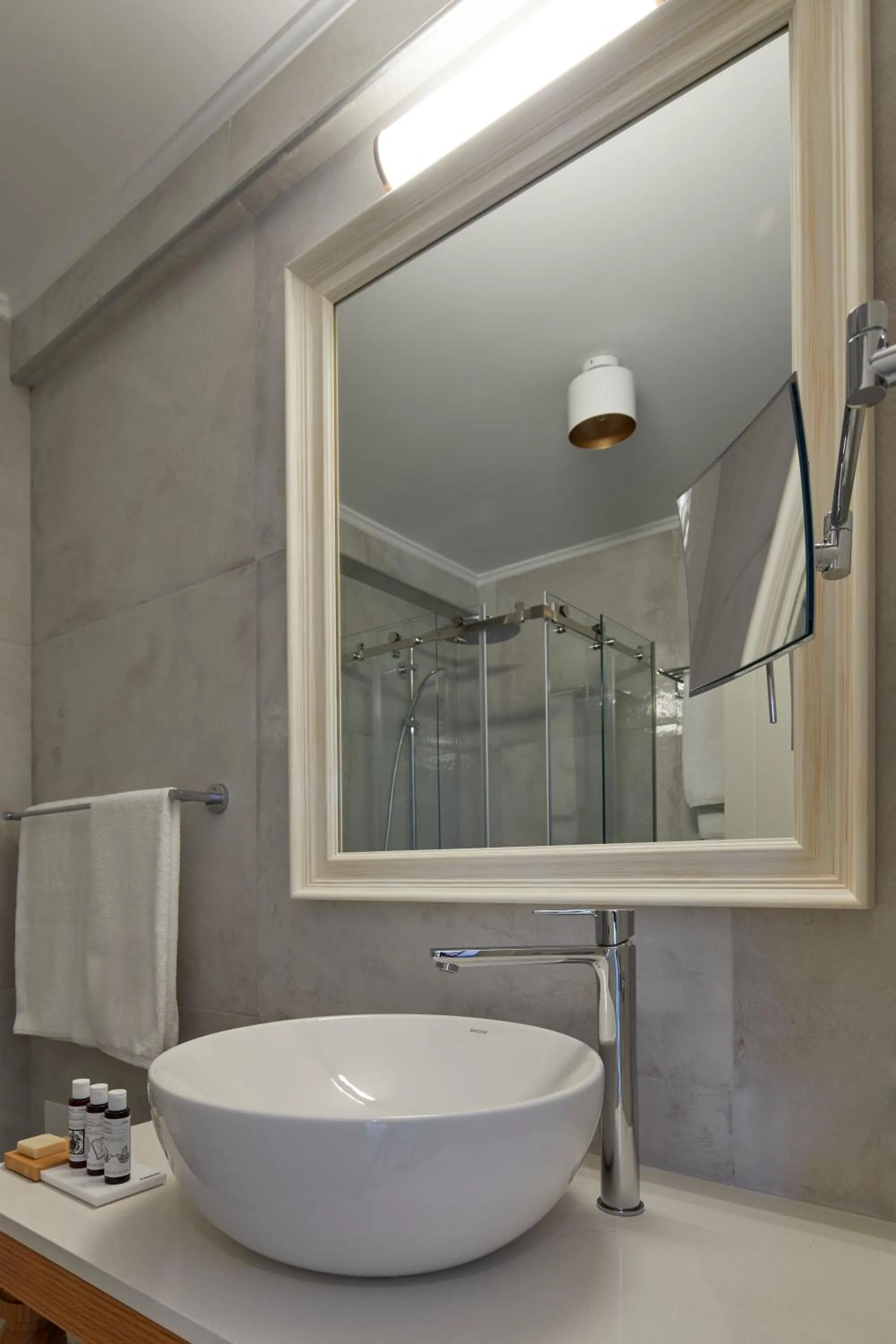 Shower in Sea Breeze Santorini Beach Resort, Curio By Hilton