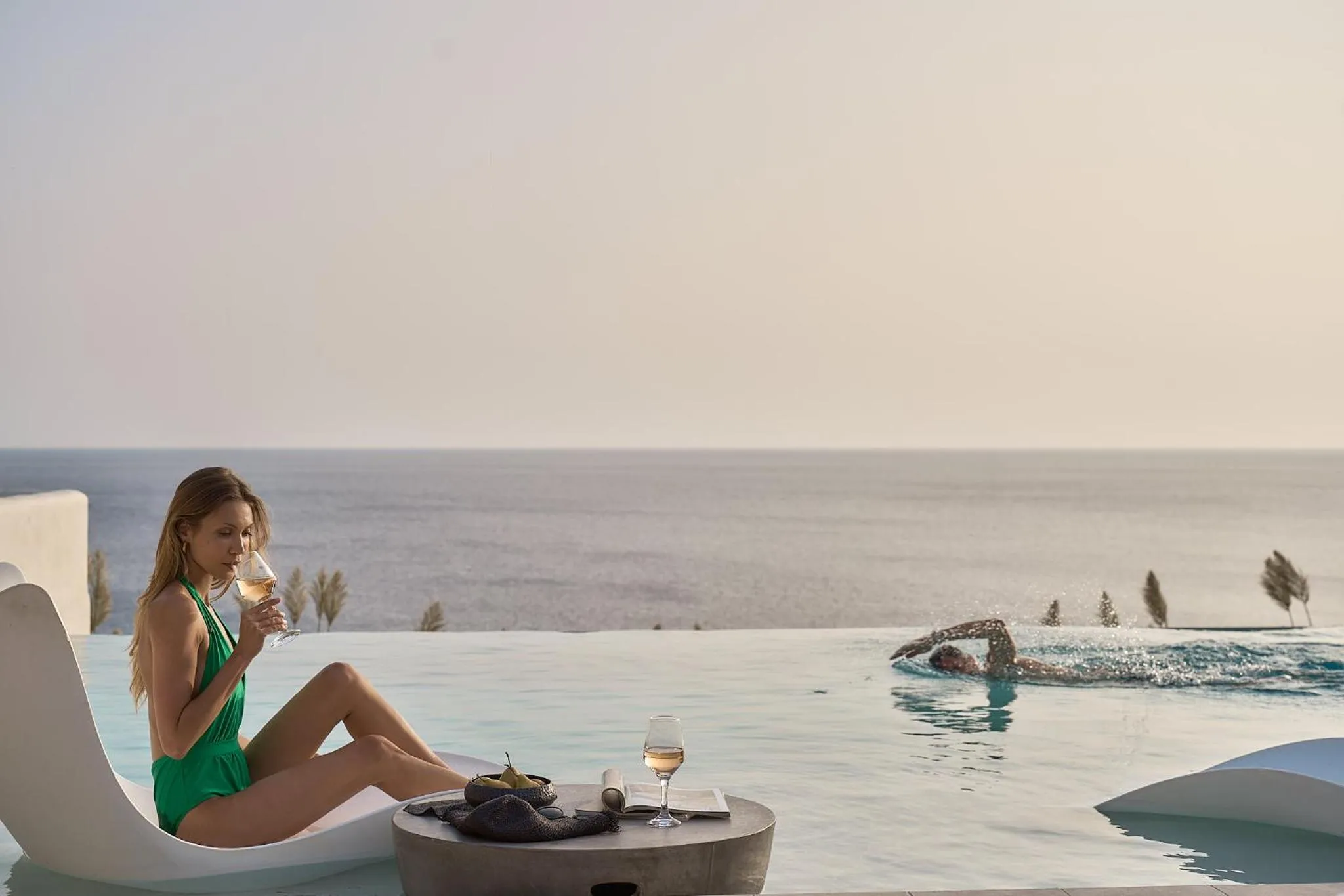 People in Ios Grand Pool Suites