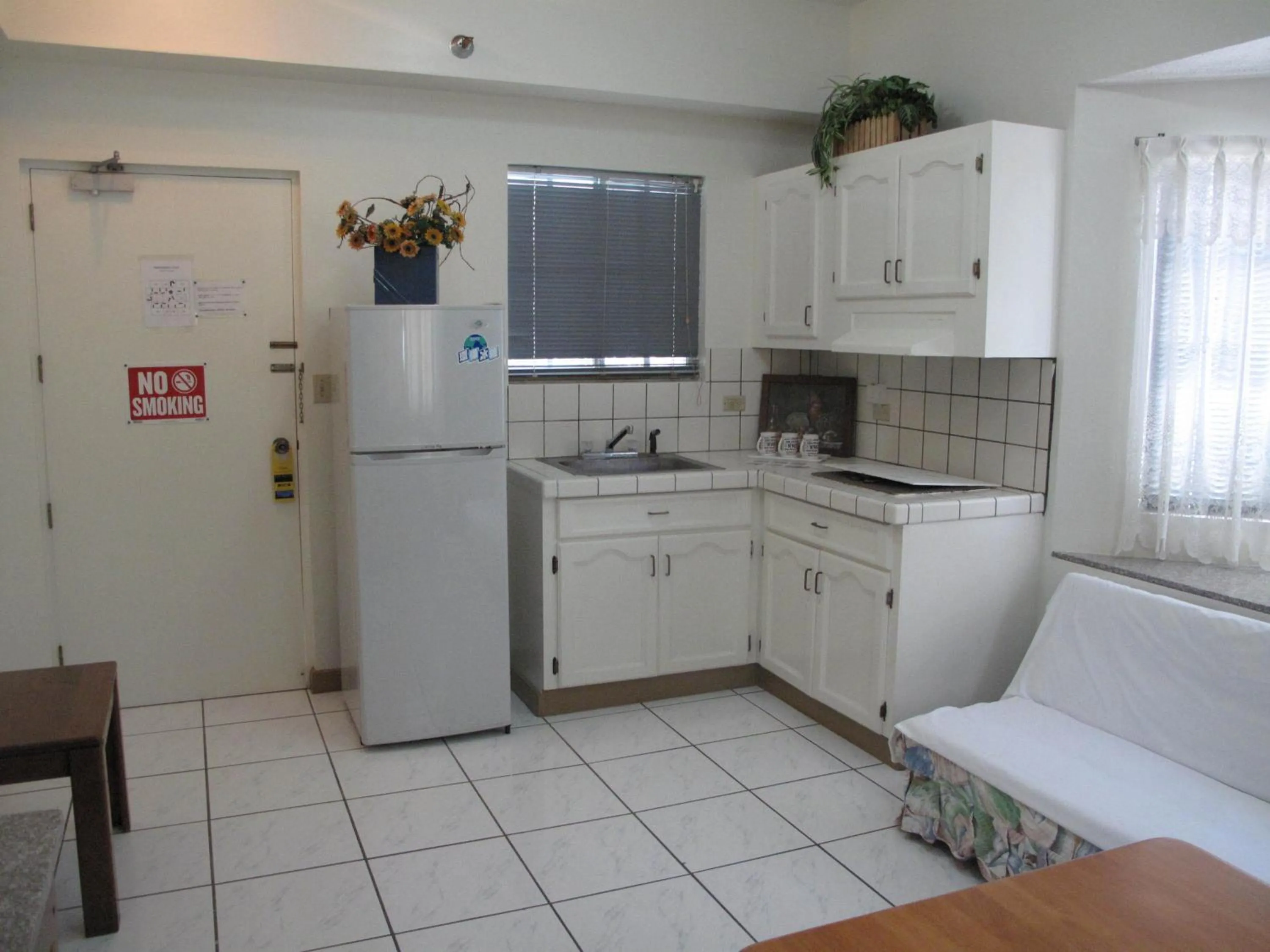 Kitchen or kitchenette in Capital Hotel