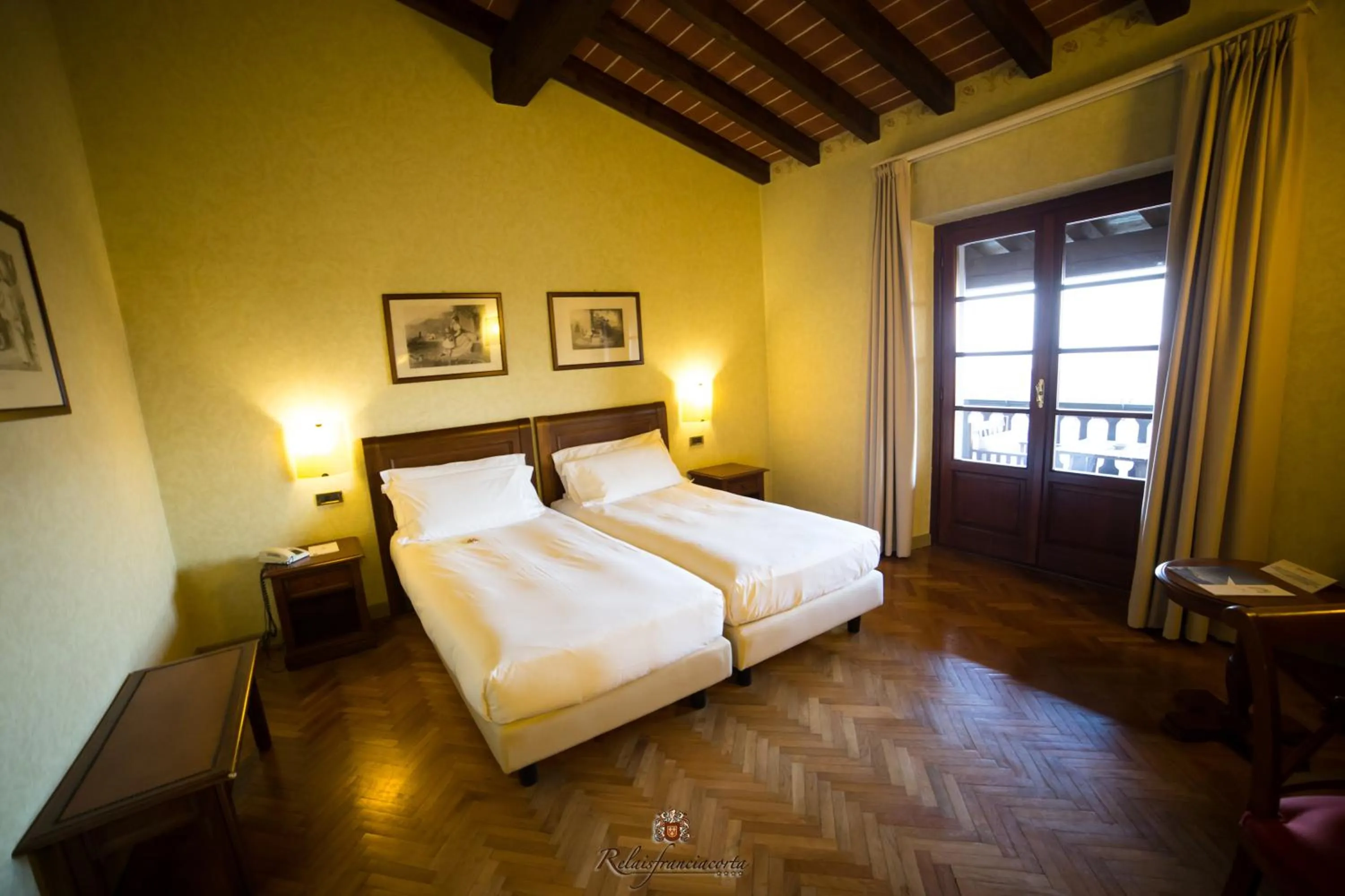 Photo of the whole room, Bed in Relaisfranciacorta