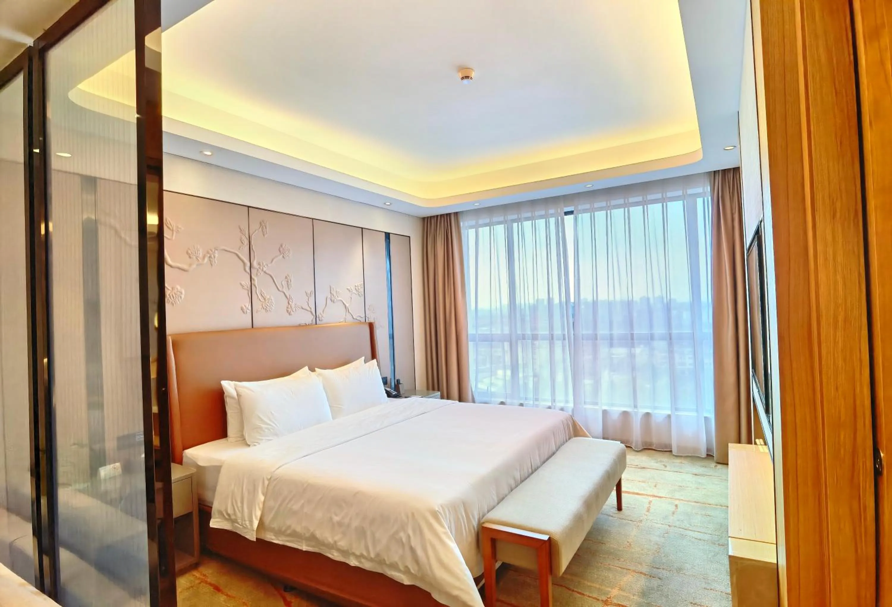 Photo of the whole room, Bed in Rising Dragon International Hotel