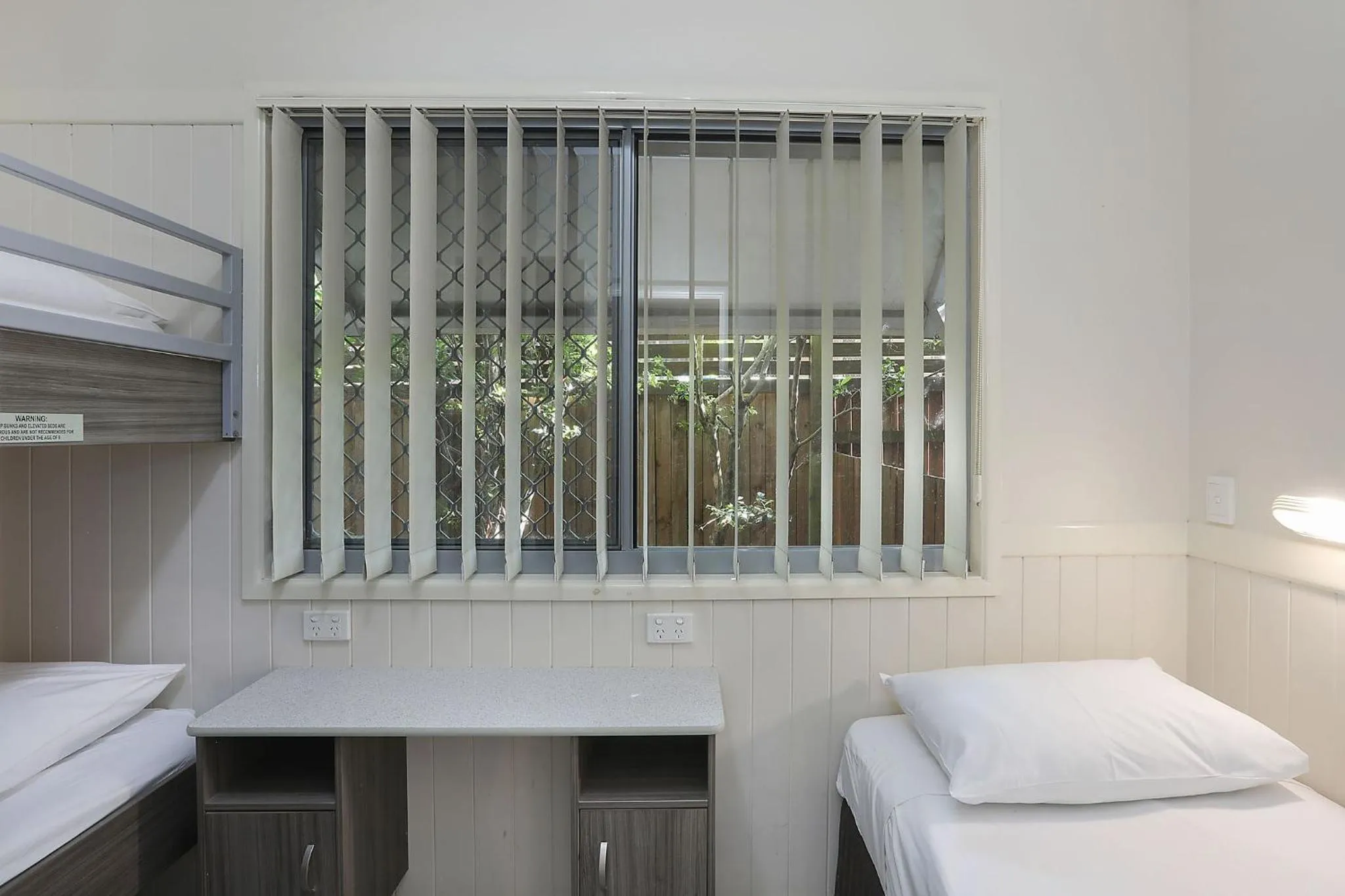 Bed in Reflections Moonee Beach - Holiday Park