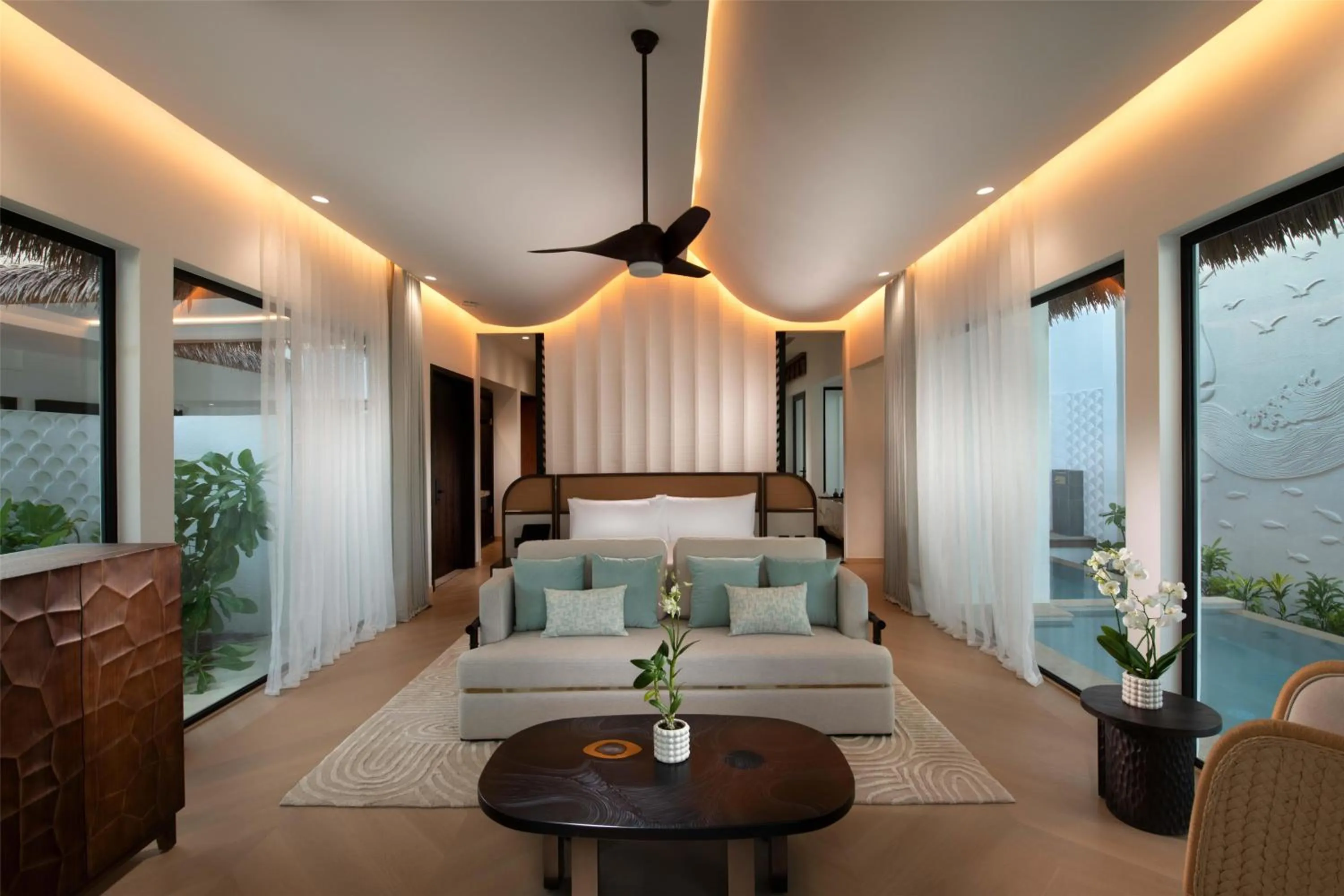 Bed in Hilton Maldives Amingiri Resort & Spa