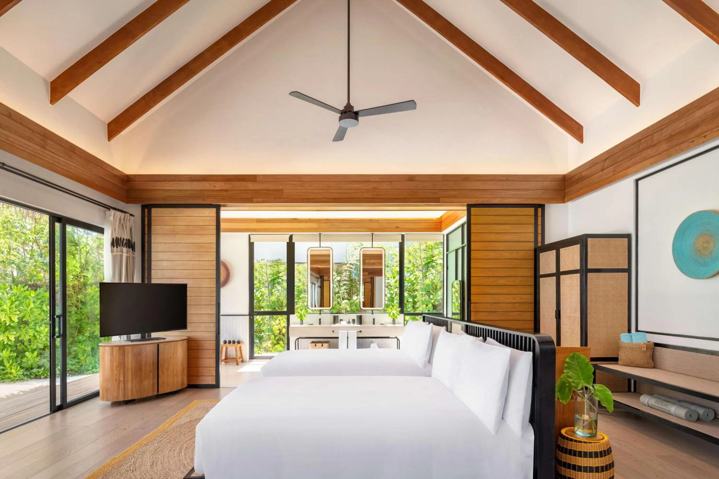 Bed in Hilton Maldives Amingiri Resort & Spa