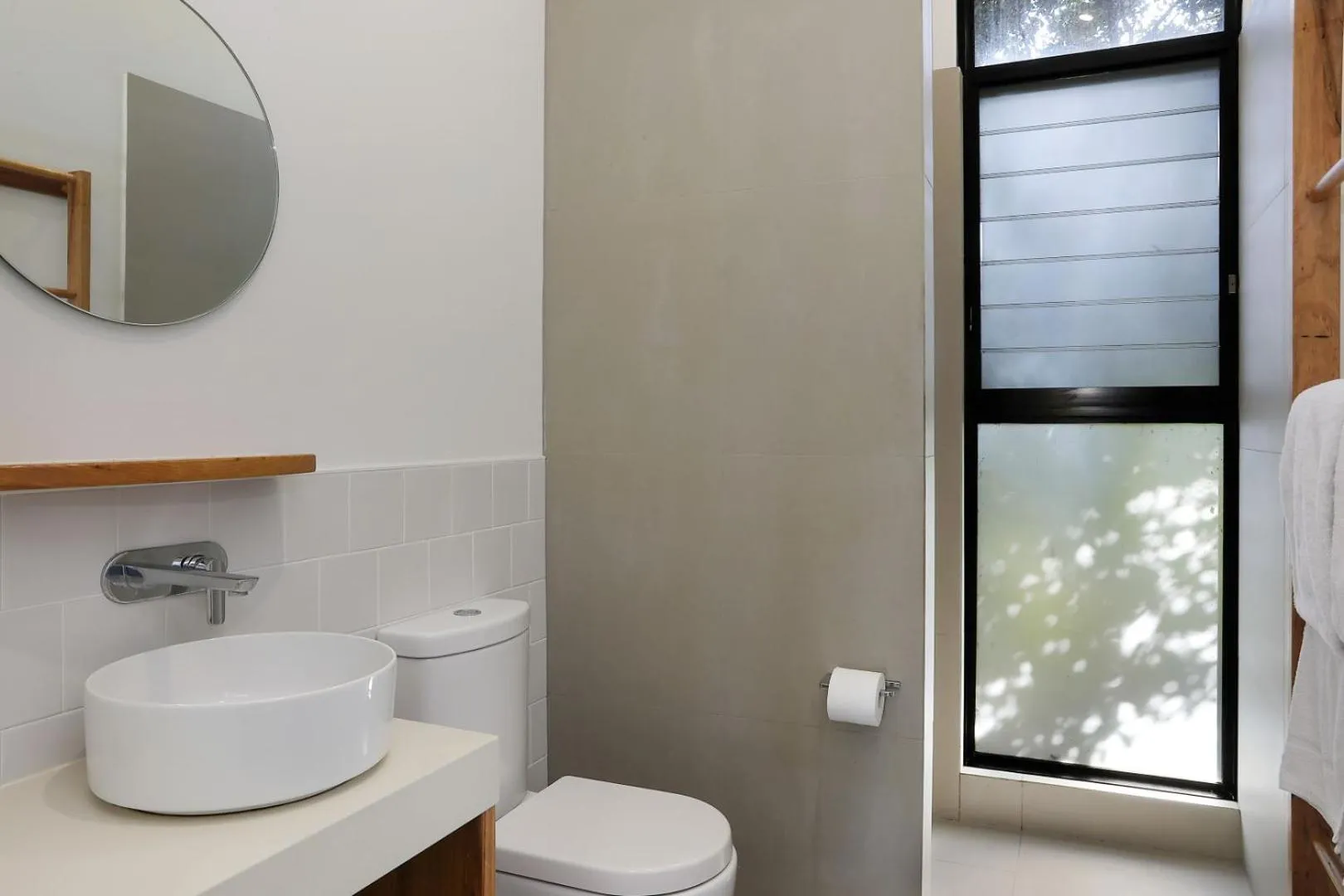 Bathroom in Reflections Byron Bay - Holiday Park