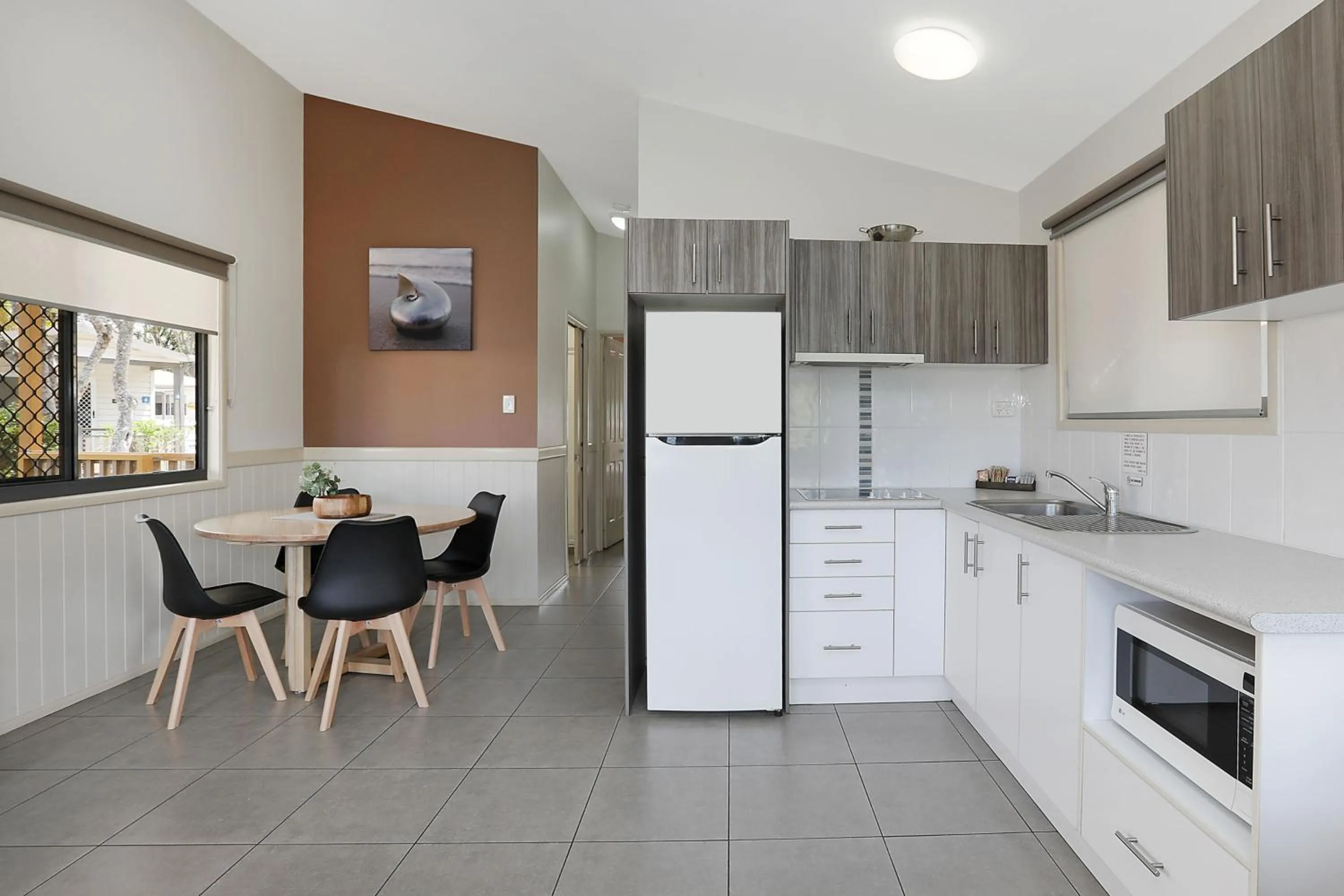 Dining area in Reflections Urunga - Holiday Park