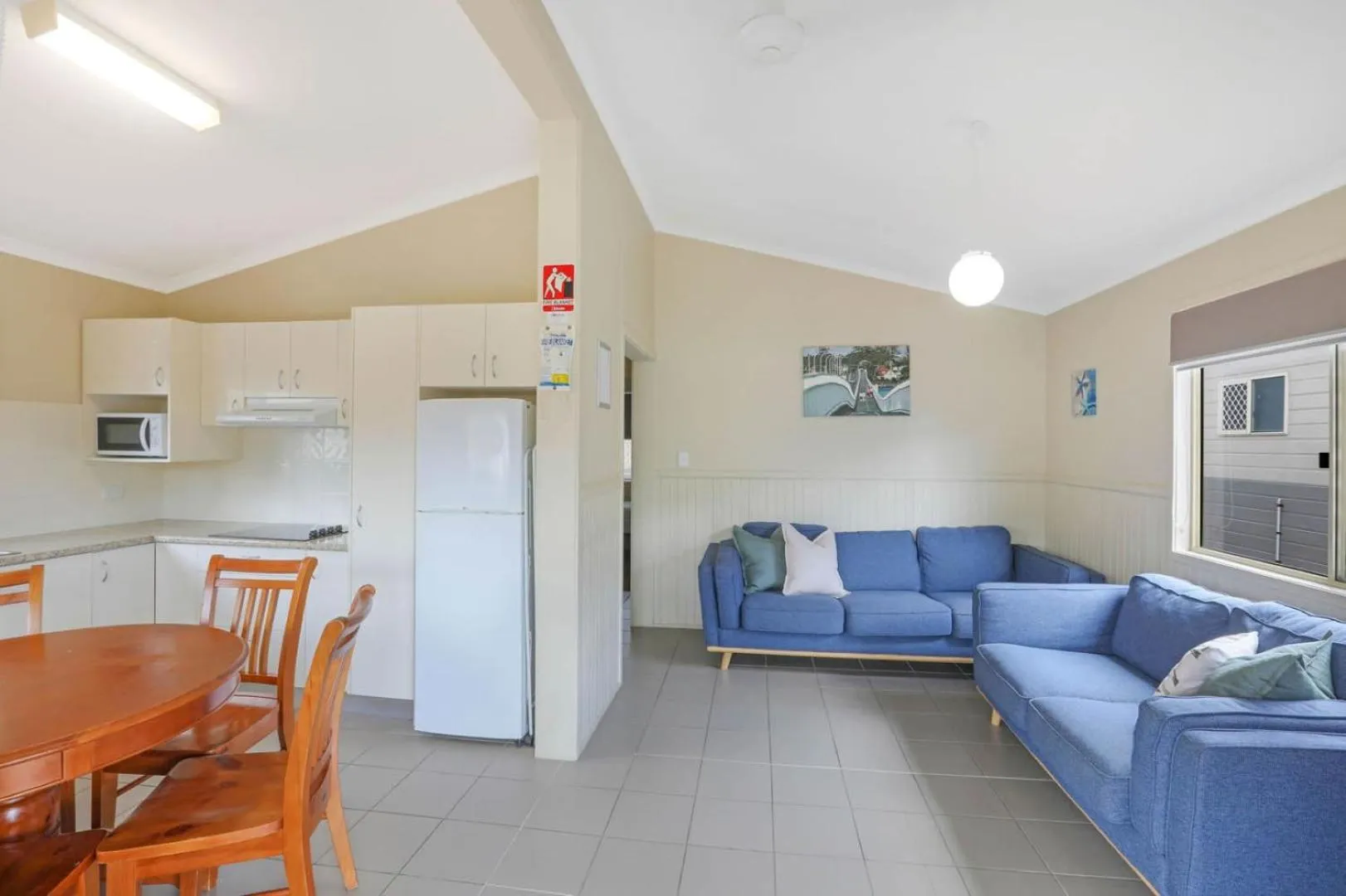 Kitchen or kitchenette in Reflections Tuncurry - Holiday Park