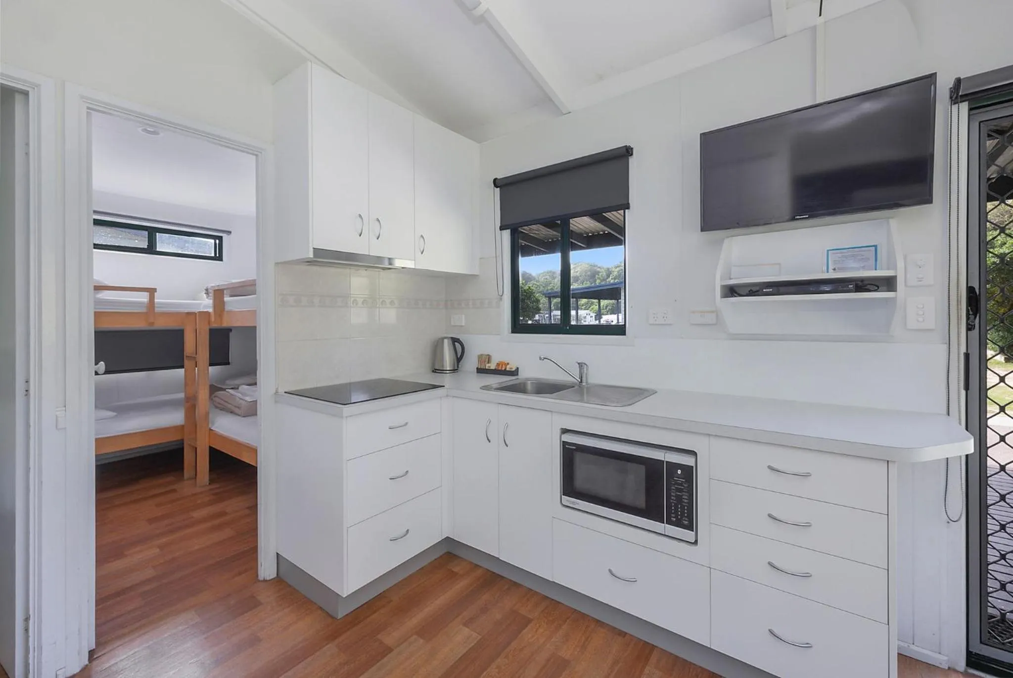 kitchen in Reflections Seal Rocks - Holiday Park