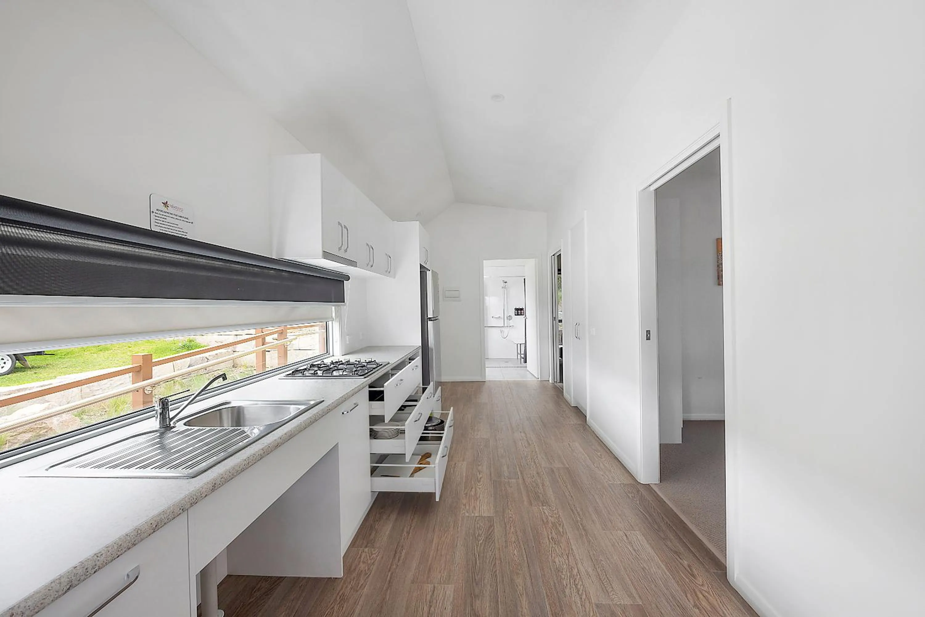 Kitchen or kitchenette in Reflections Bermagui - Holiday Park