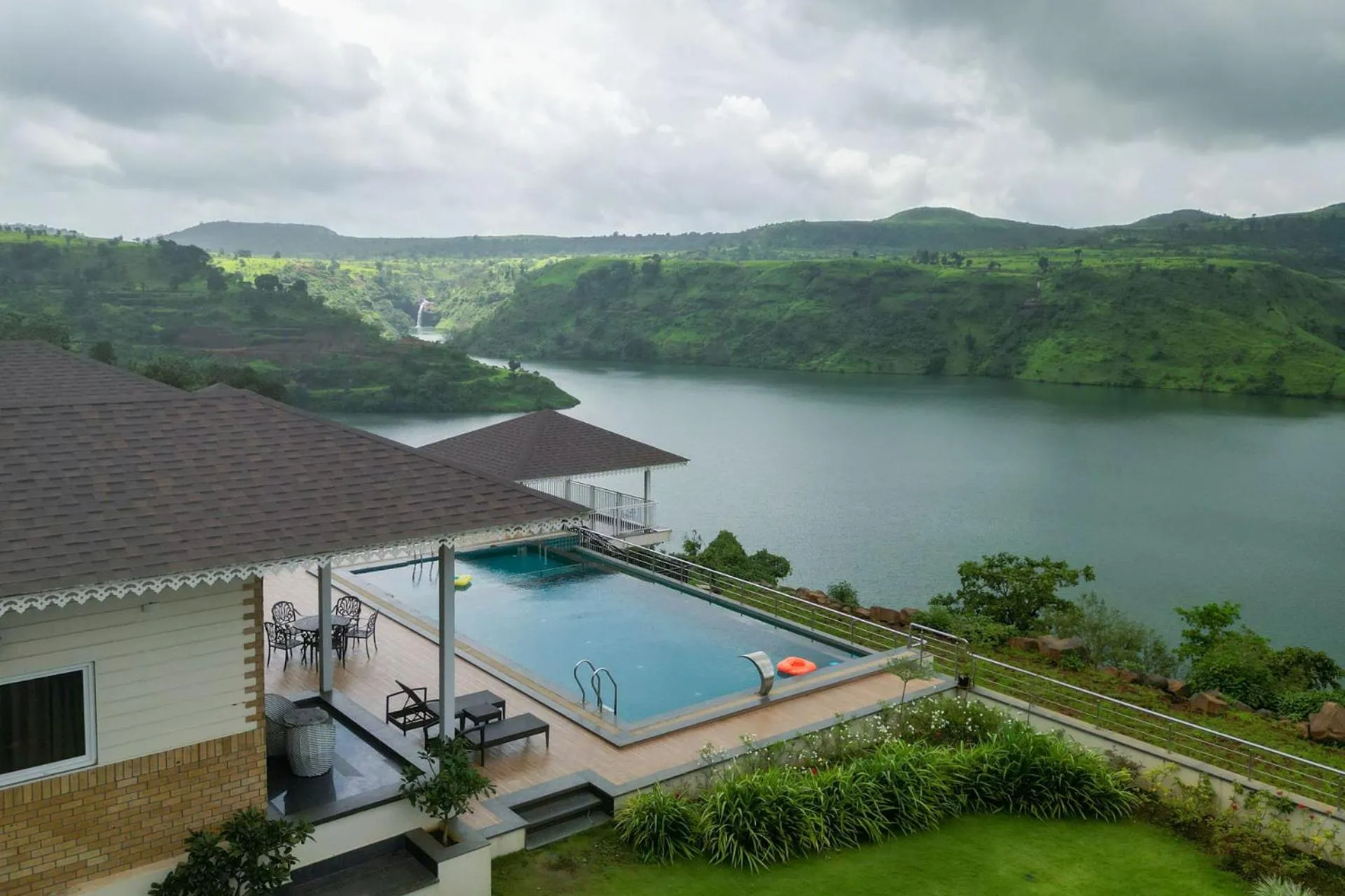 Property building in Lake Arches by StayVista - Lakeside villa with Infinity pool, Gazebo & Modern Greek interiors