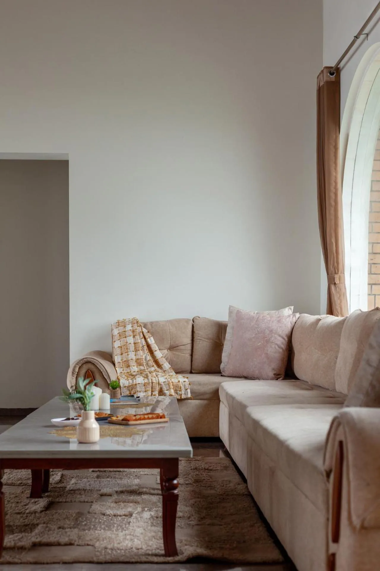 Living room in Lake Arches by StayVista - Lakeside villa with Infinity pool, Gazebo & Modern Greek interiors