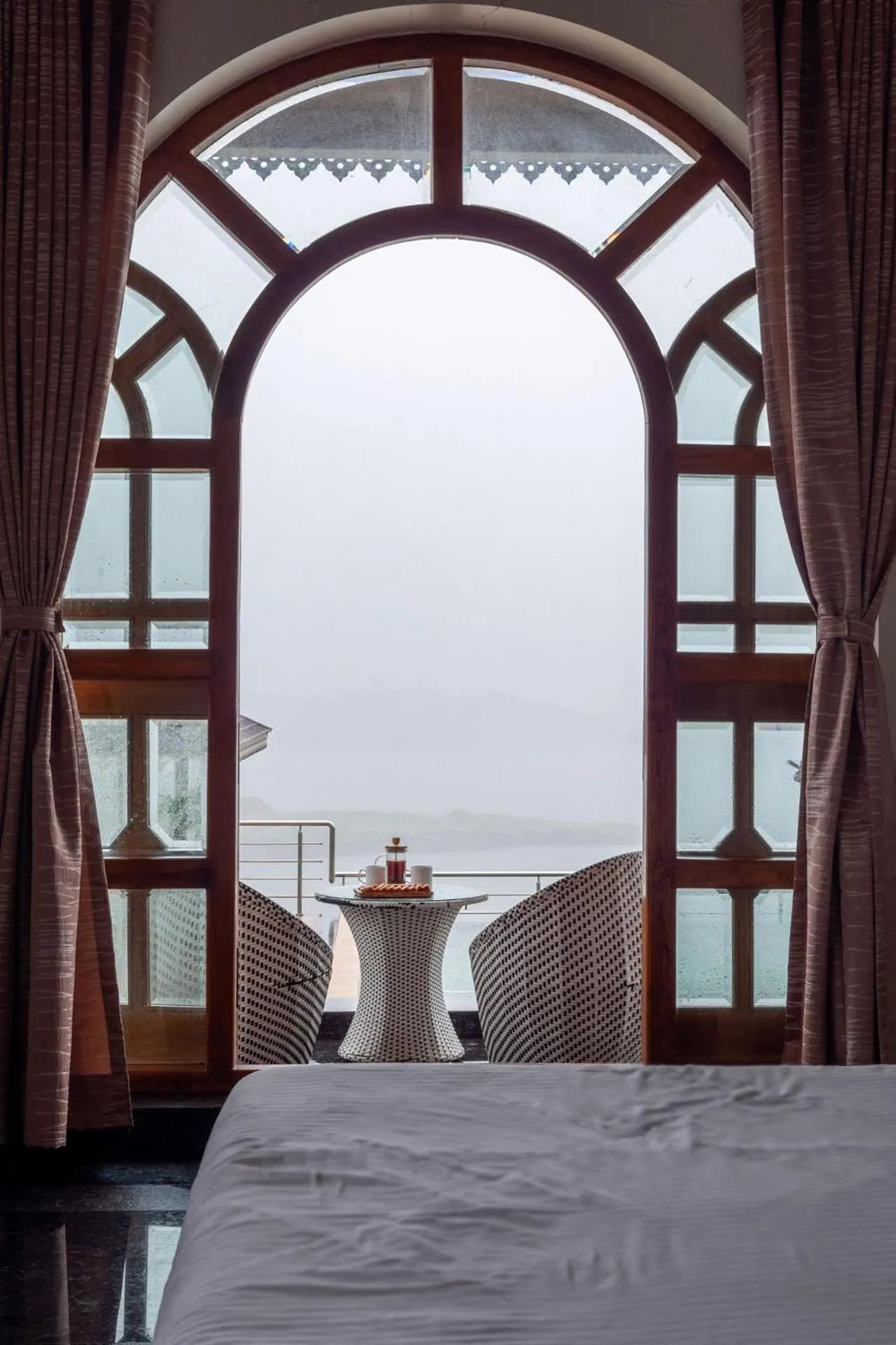 Bedroom, Bed in Lake Arches by StayVista - Lakeside villa with Infinity pool, Gazebo & Modern Greek interiors