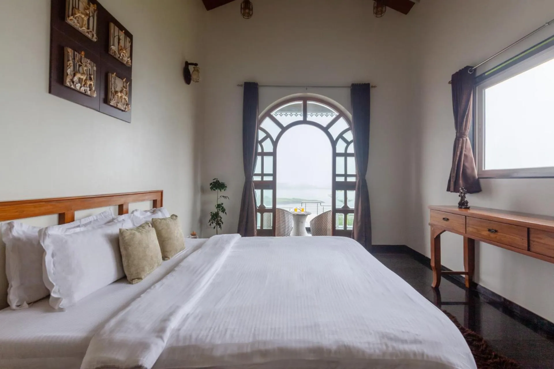 Bedroom, Bed in Lake Arches by StayVista - Lakeside villa with Infinity pool, Gazebo & Modern Greek interiors