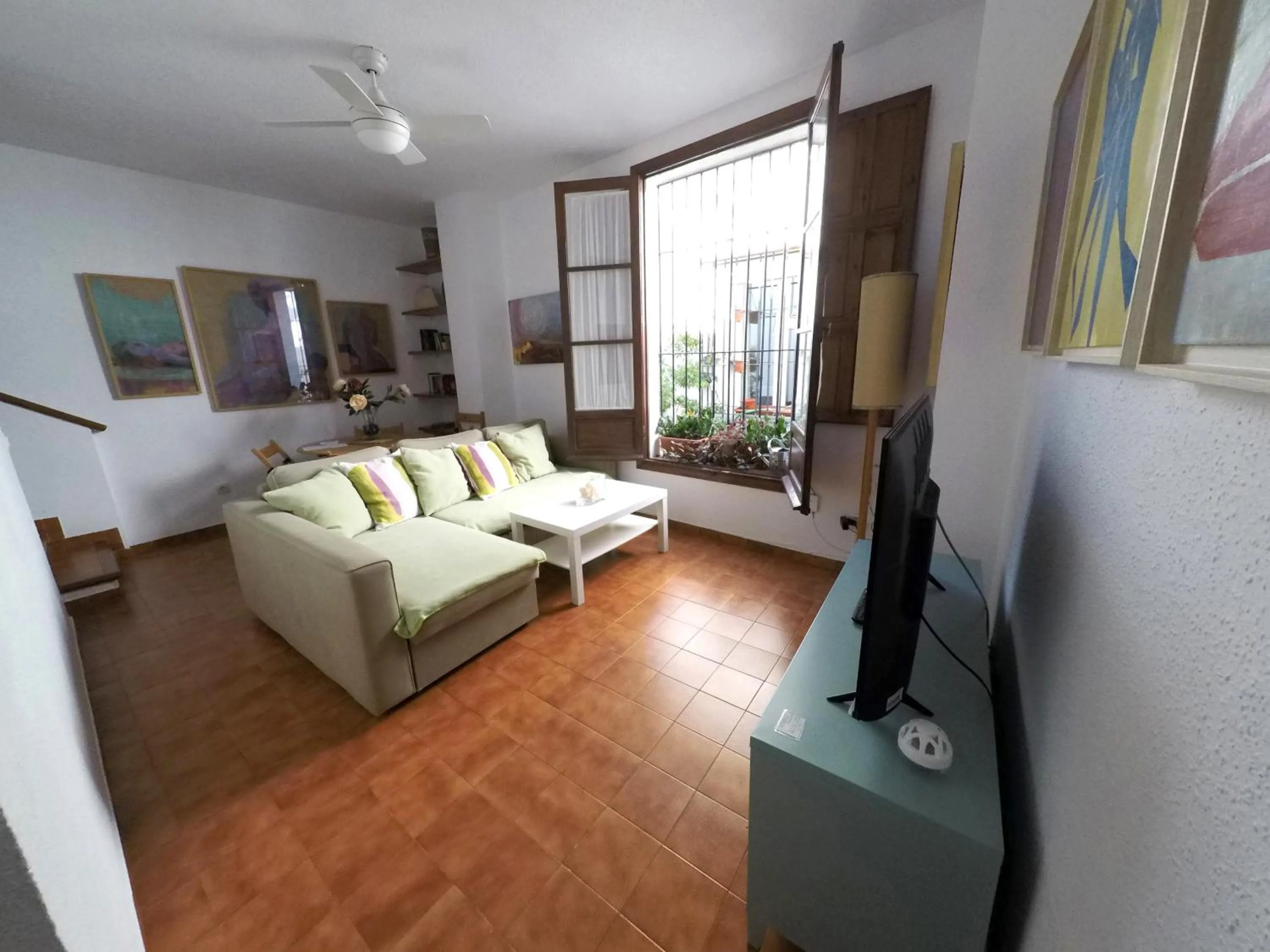 Communal lounge/ TV room in Duplex acogedor con gran terraza en pleno centro de Sevilla!