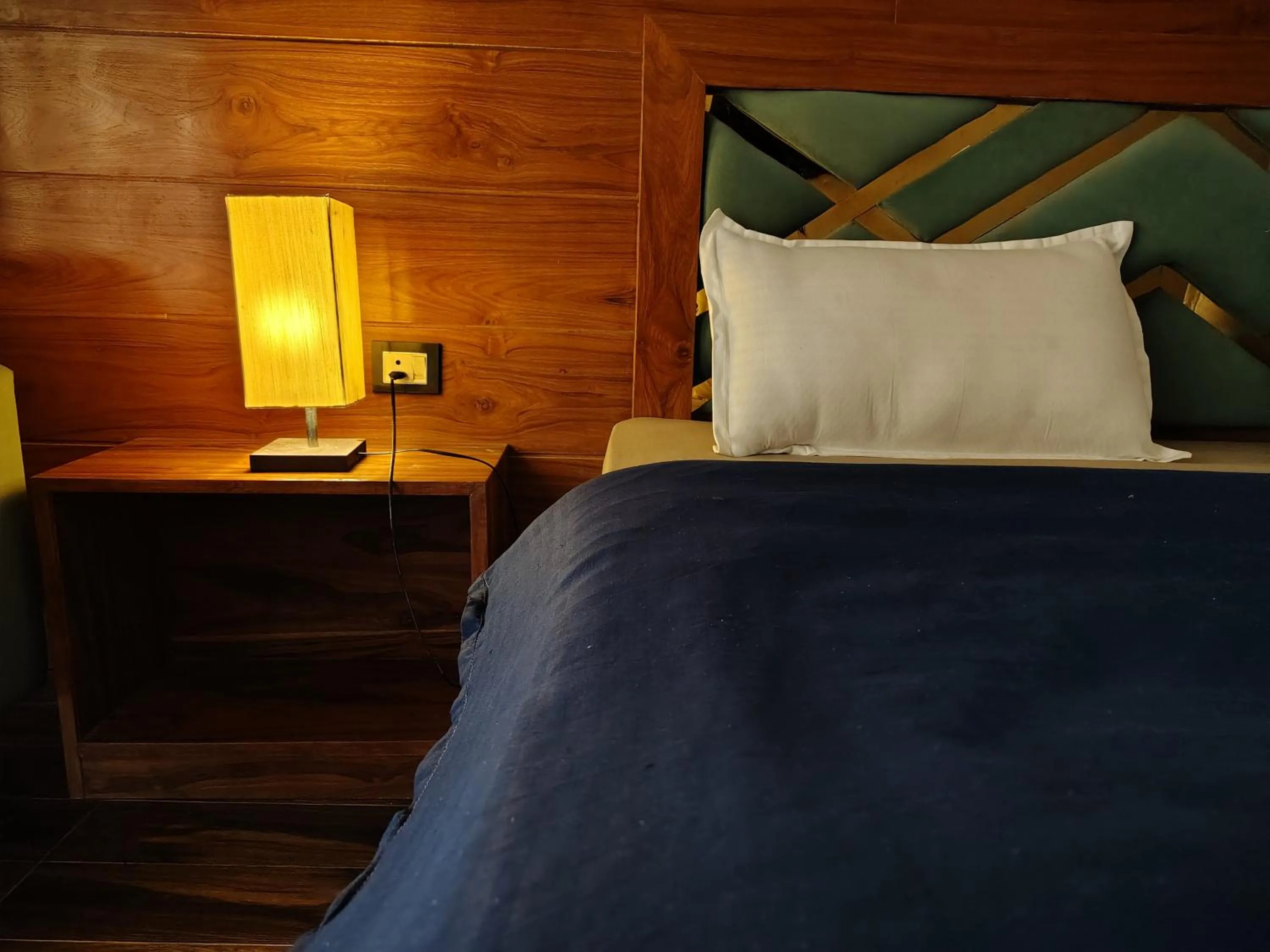 Bed in Chakrata Inn Resort