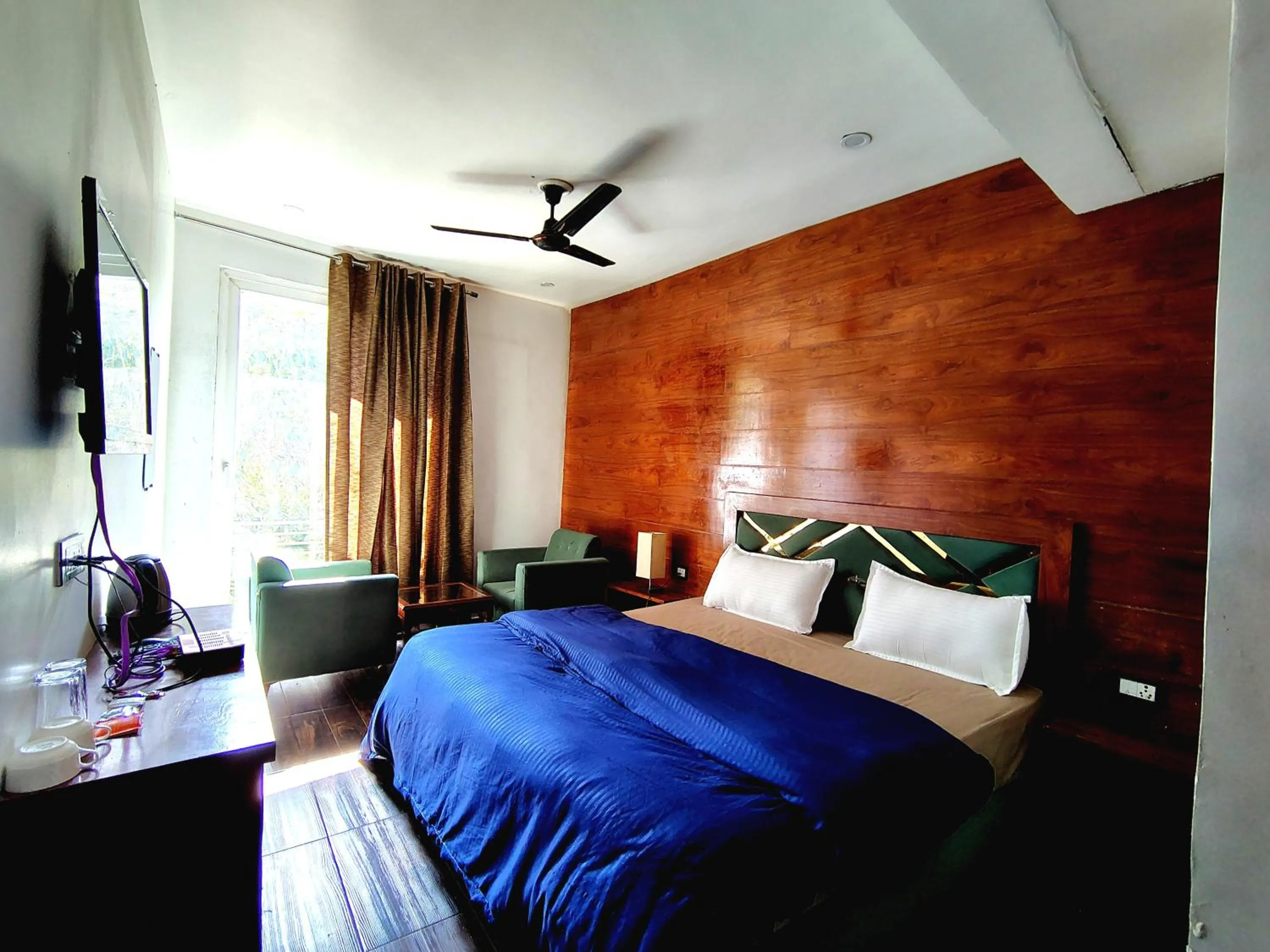 Bedroom in Chakrata Inn Resort