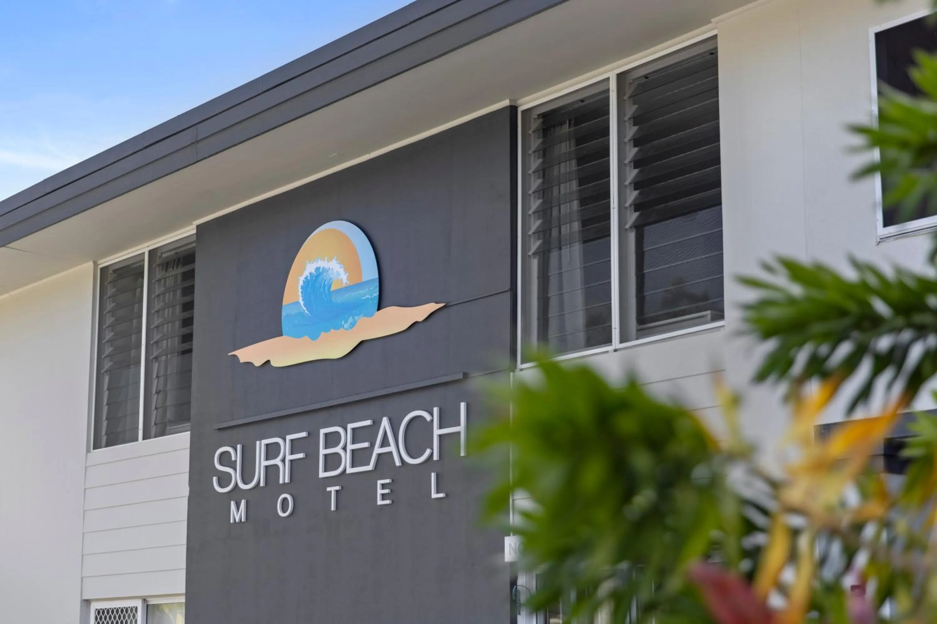 Property logo or sign in Surf Beach Motel Coffs