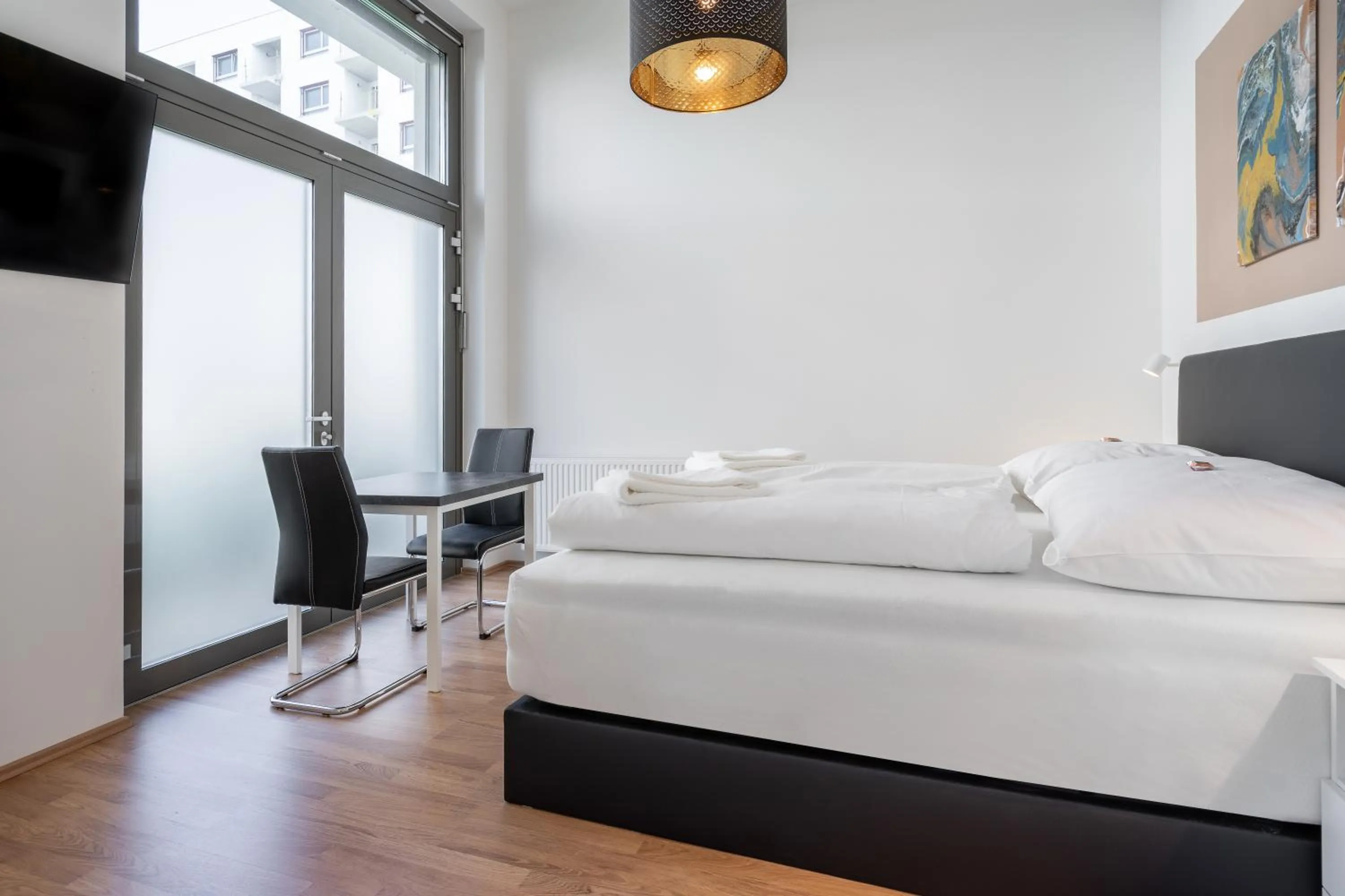 Bed in FeelGood Apartments LakeLiving inklusive Garagenplatz