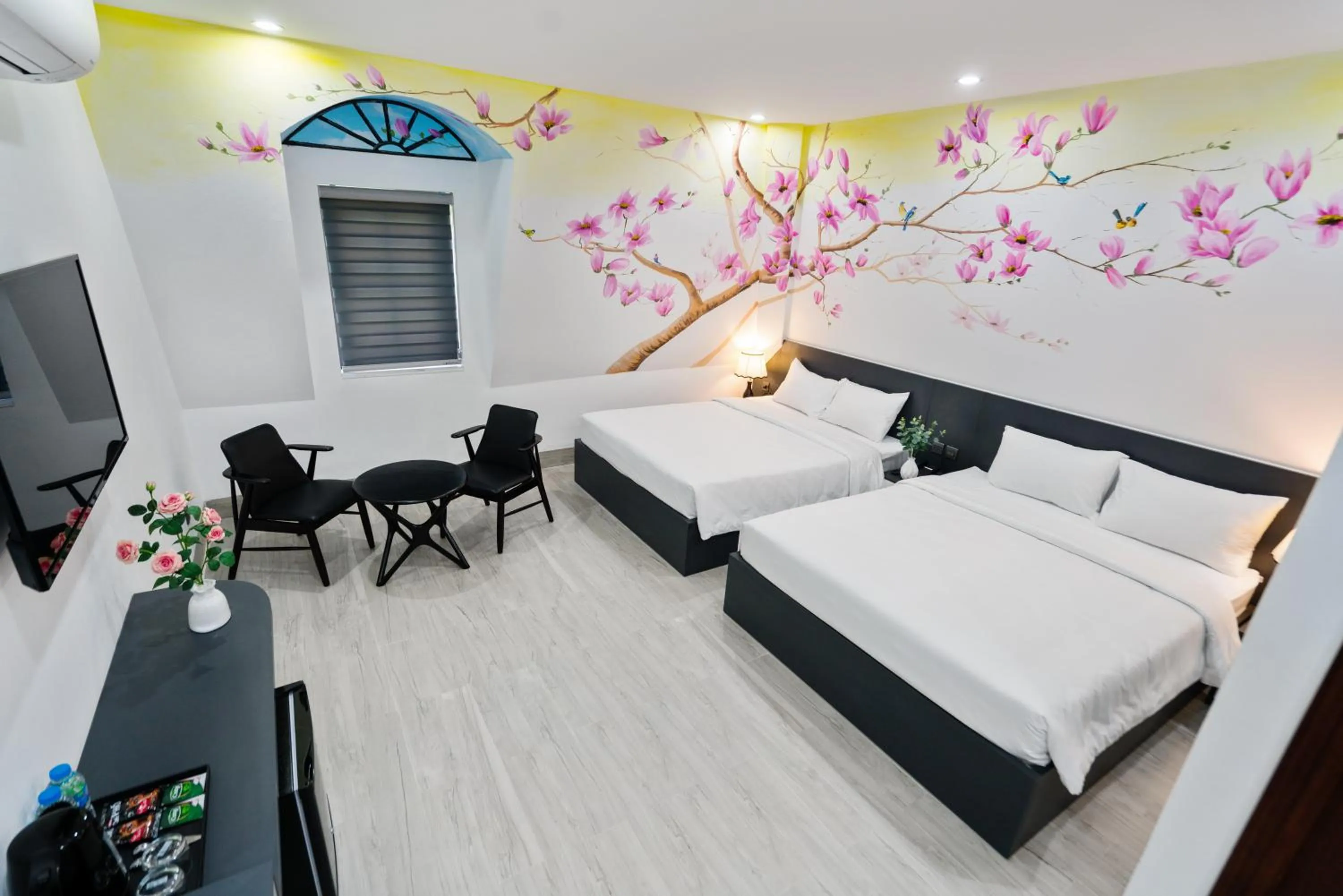 Photo of the whole room, Bed in The Enchanted Ha Long Hotel