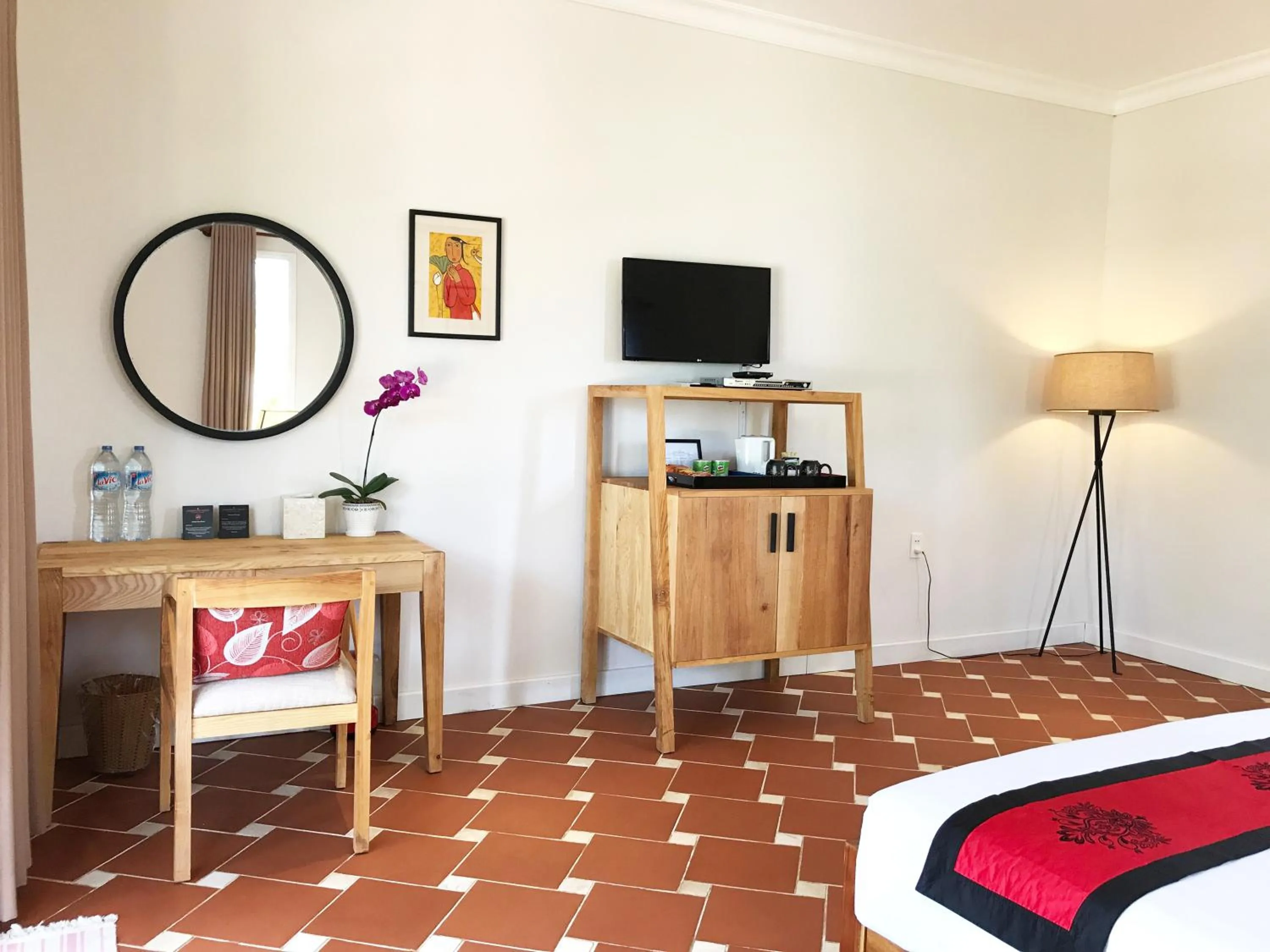 Bed in Peppercorn Beach Resort