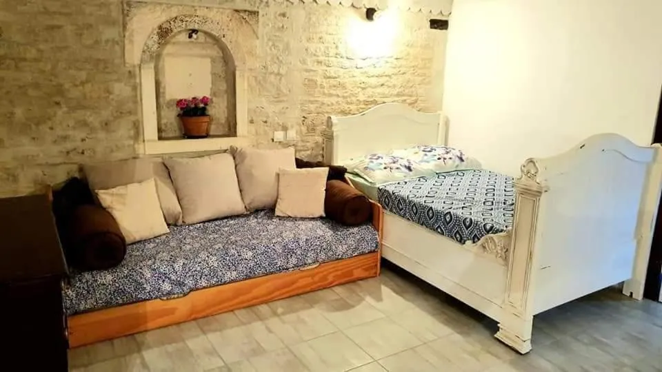 Bed in La Fontenelle Chambres d'Hôtes