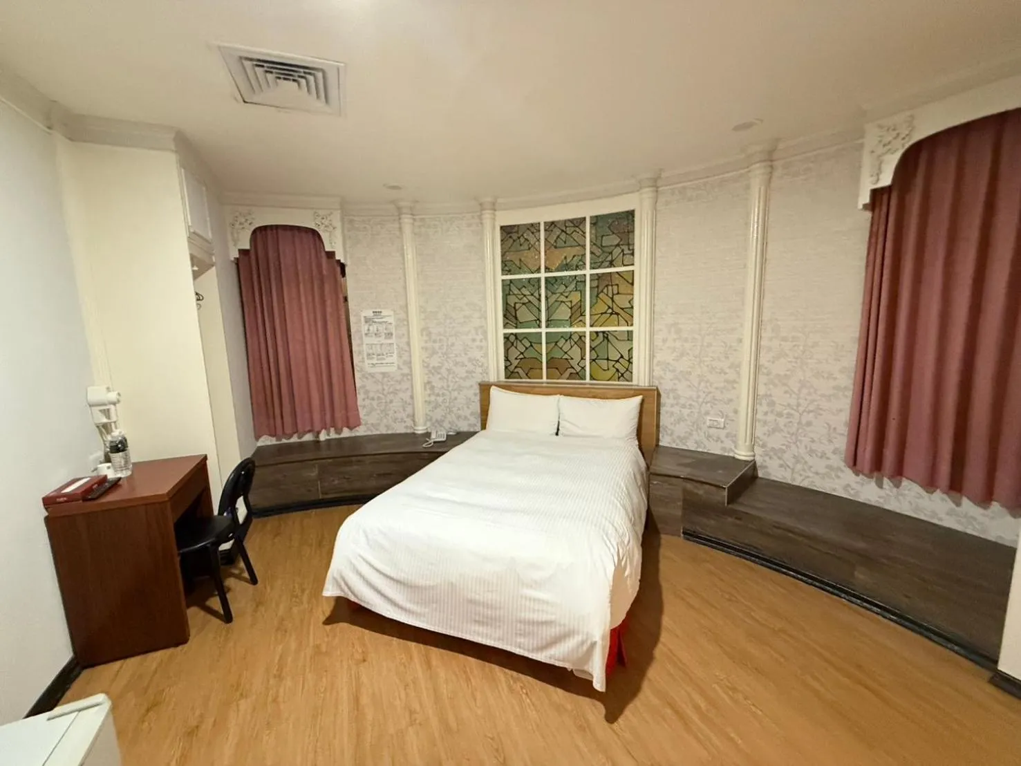 Bed in The Prince Hotel