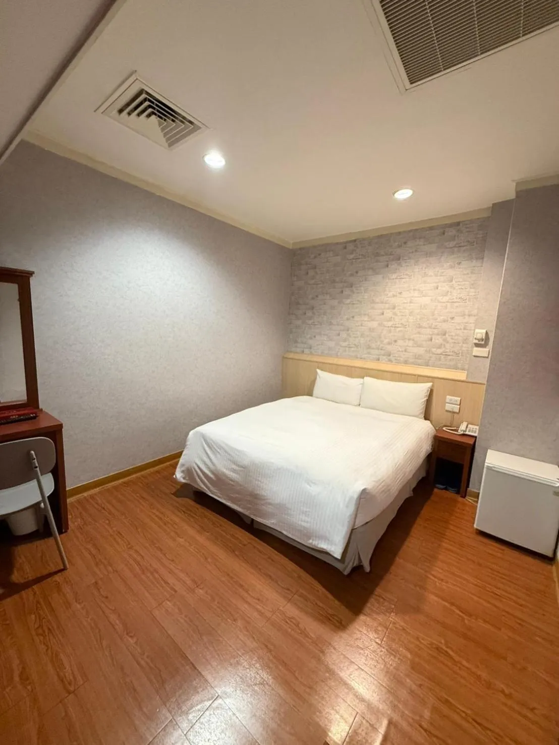 Bed in The Prince Hotel