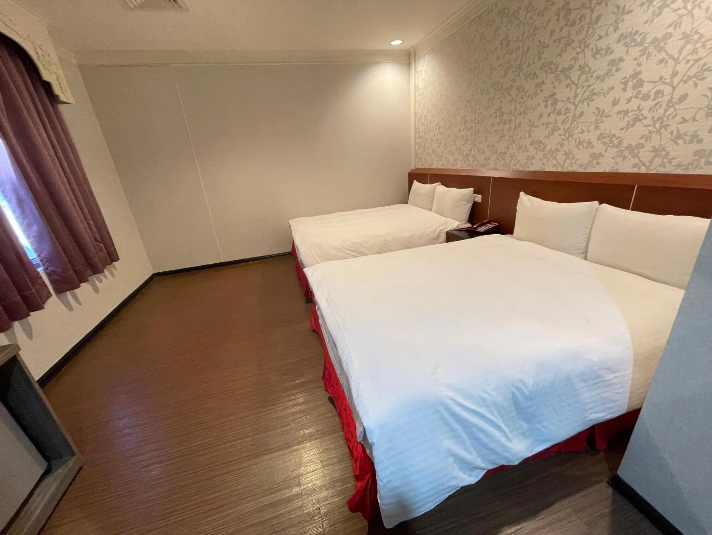 Bed in The Prince Hotel