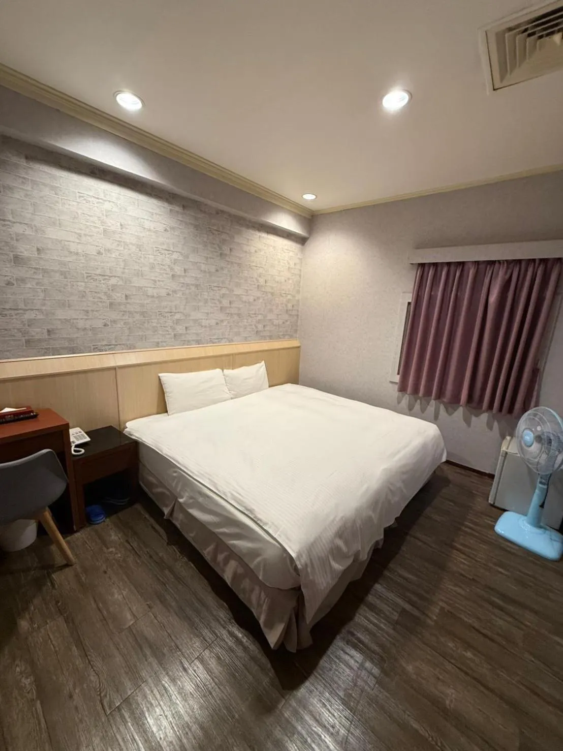 Bed in The Prince Hotel