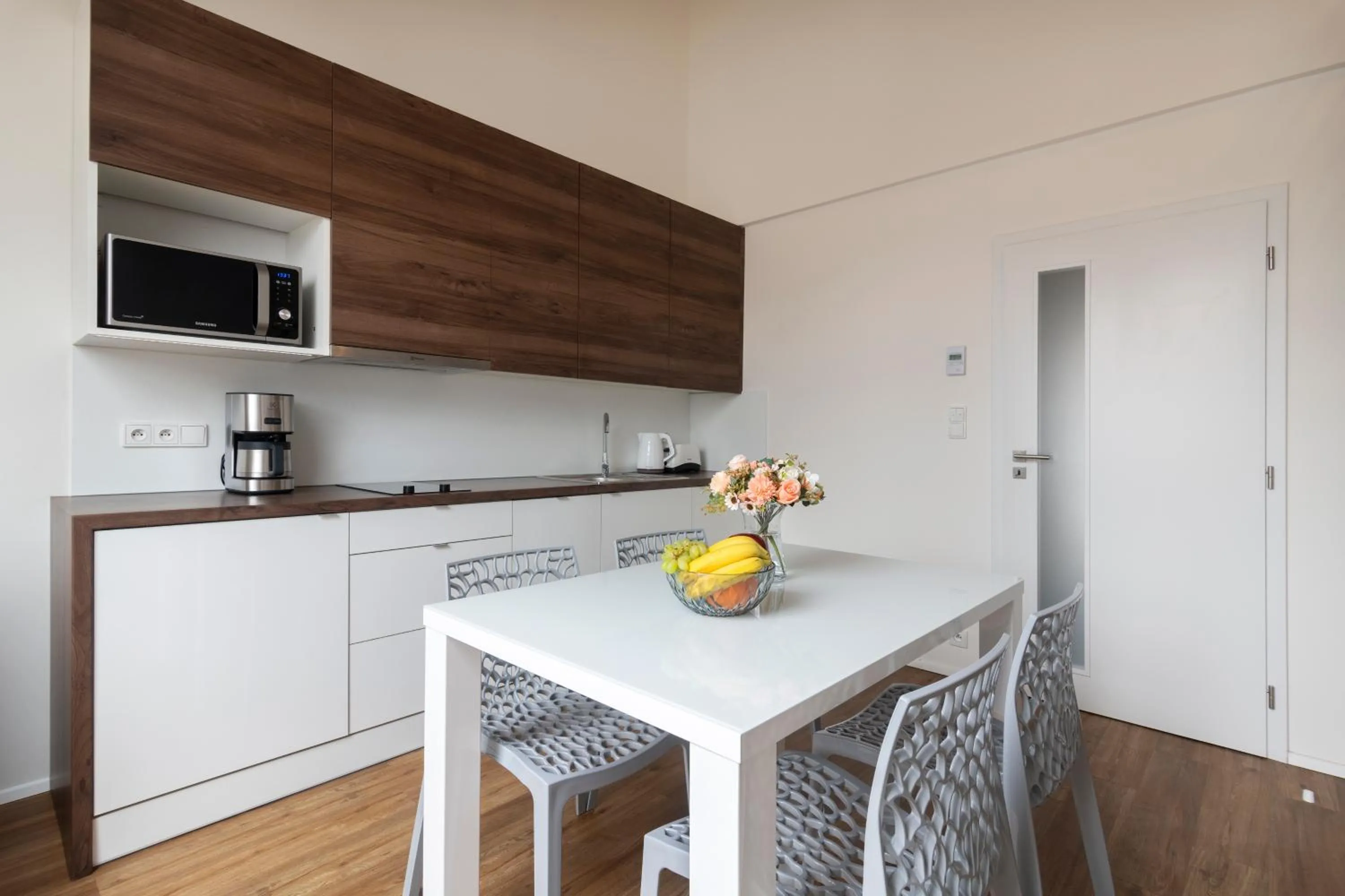 Kitchen or kitchenette in Prague Tales Boutique Residence by Dwellfort