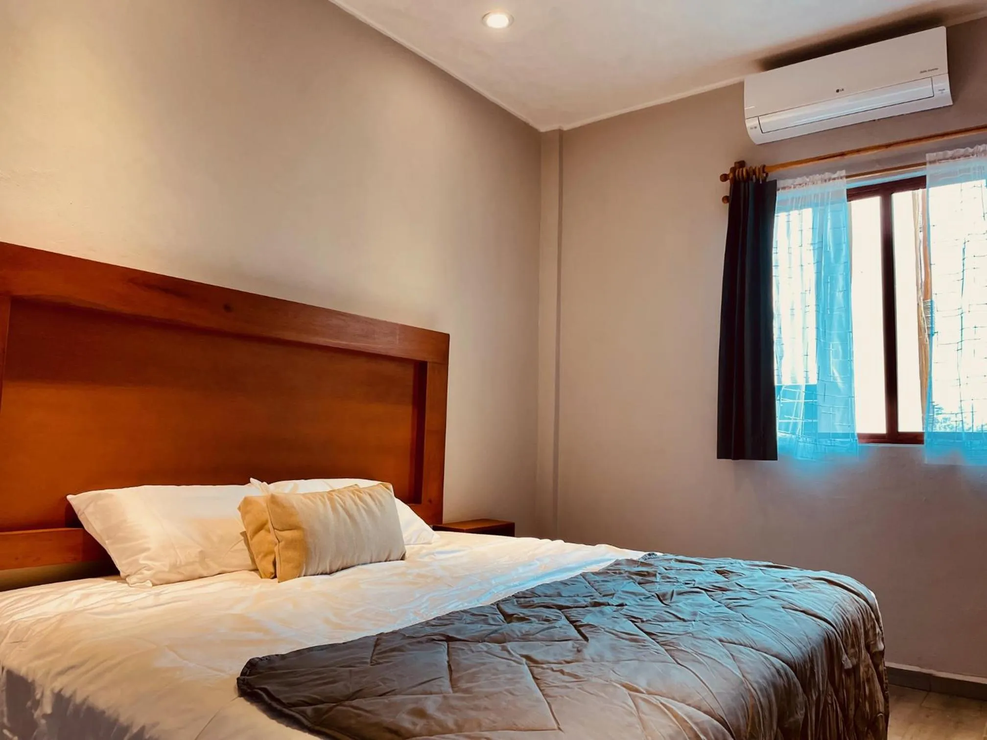 Bed in Hotel Manglar Suites