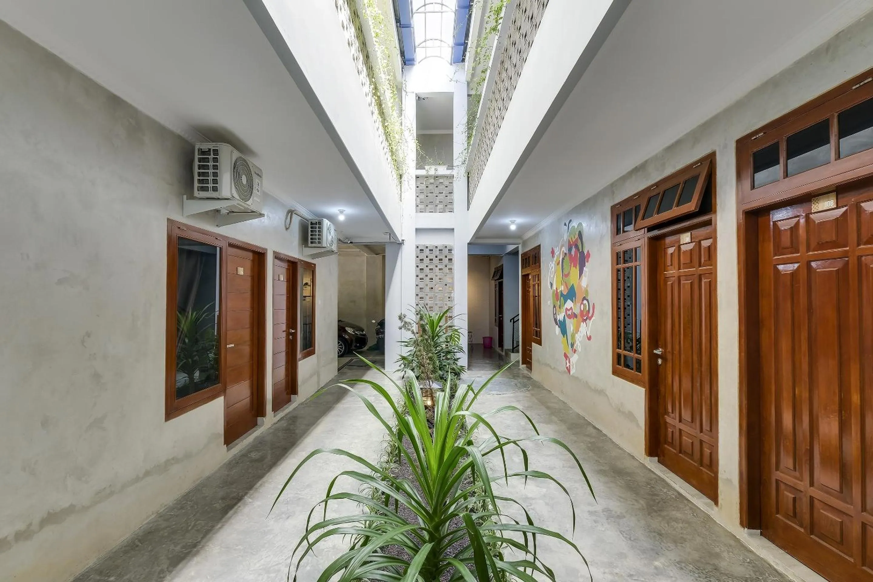 Lobby or reception in Capital O 90983 Harmony Easy Stay