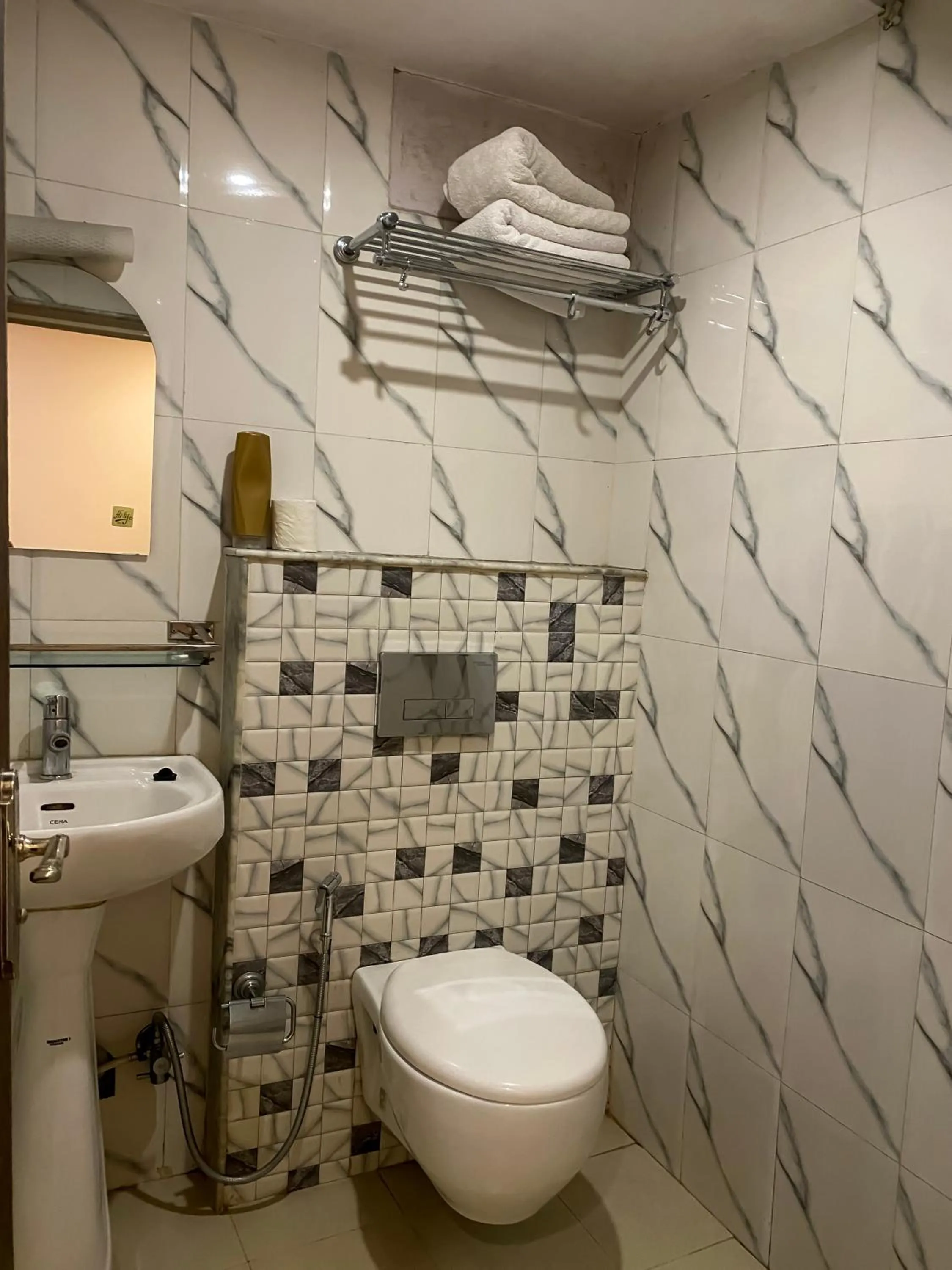 Toilet in Lemon Tree Hotel Pvt. Ltd