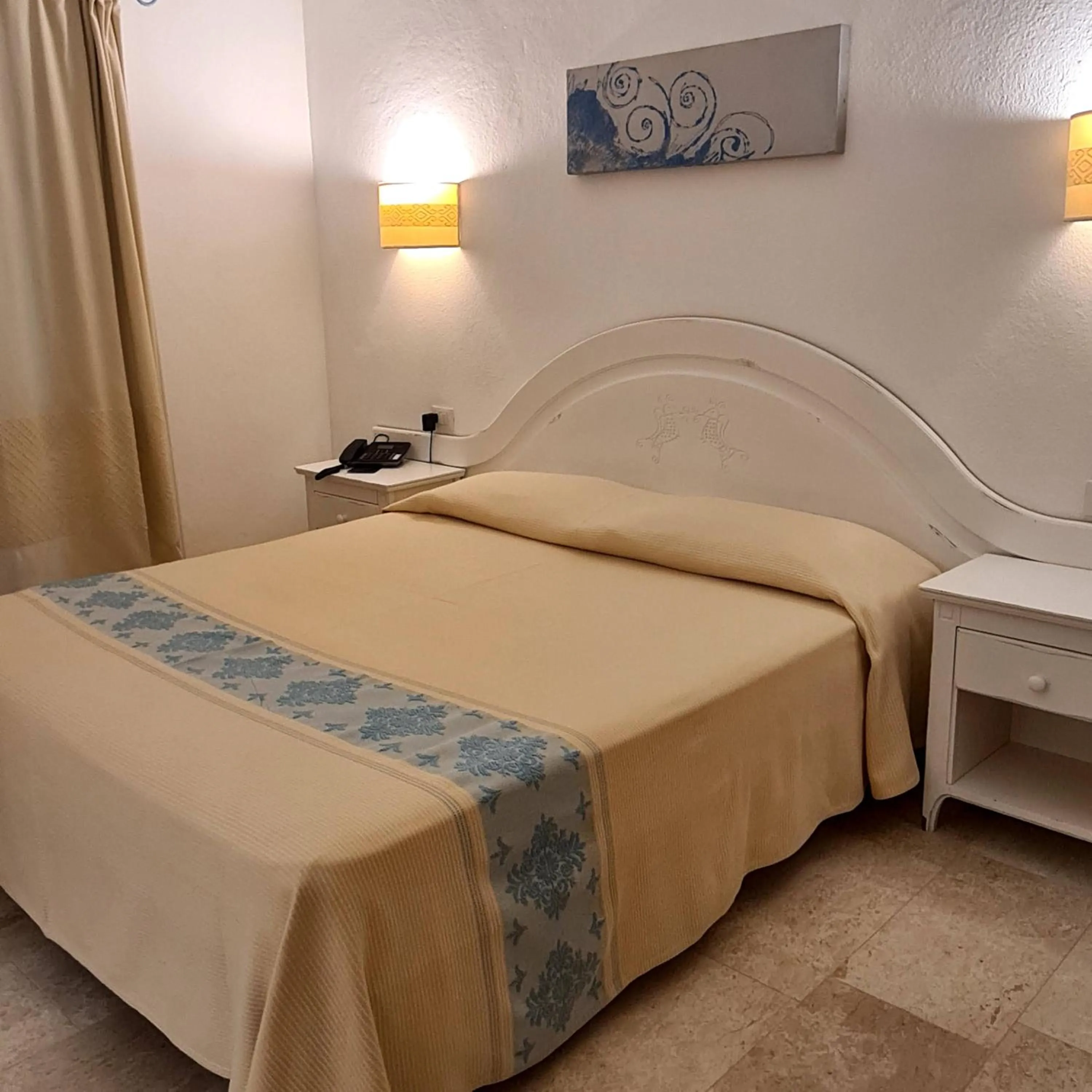 Bed in Hotel Garden Beach