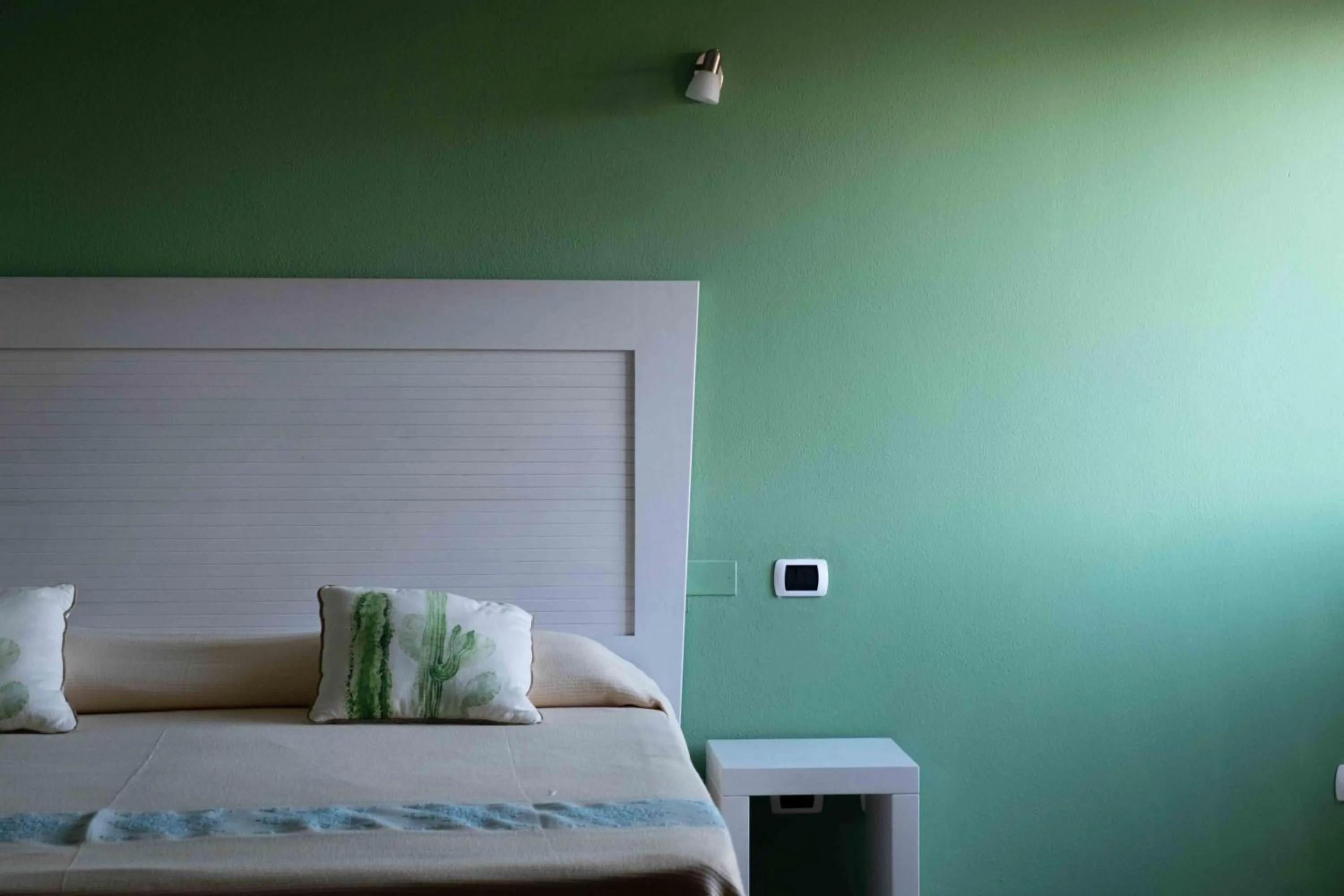 Bed in Hotel Garden Beach