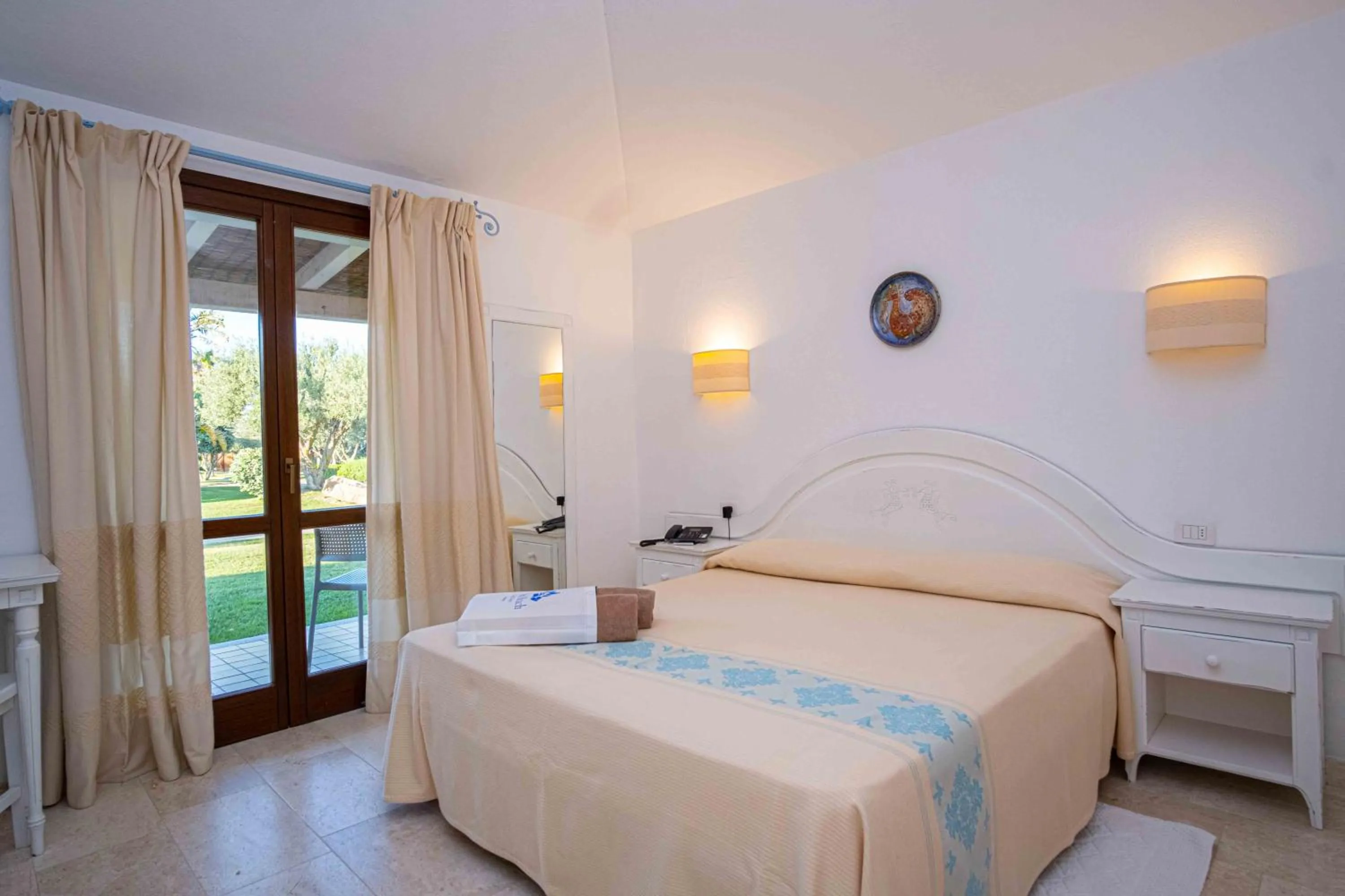 Bed in Hotel Garden Beach