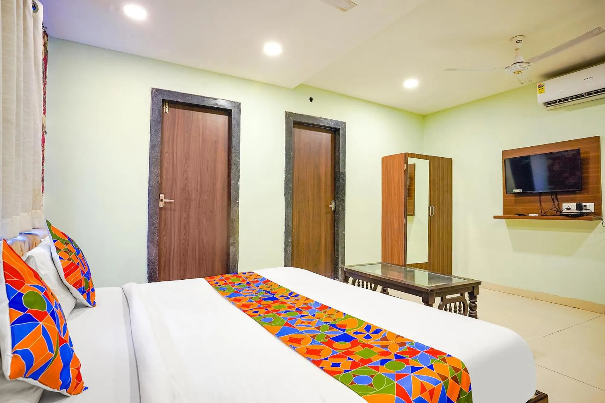 Bed in FabHotel Uday Vilas