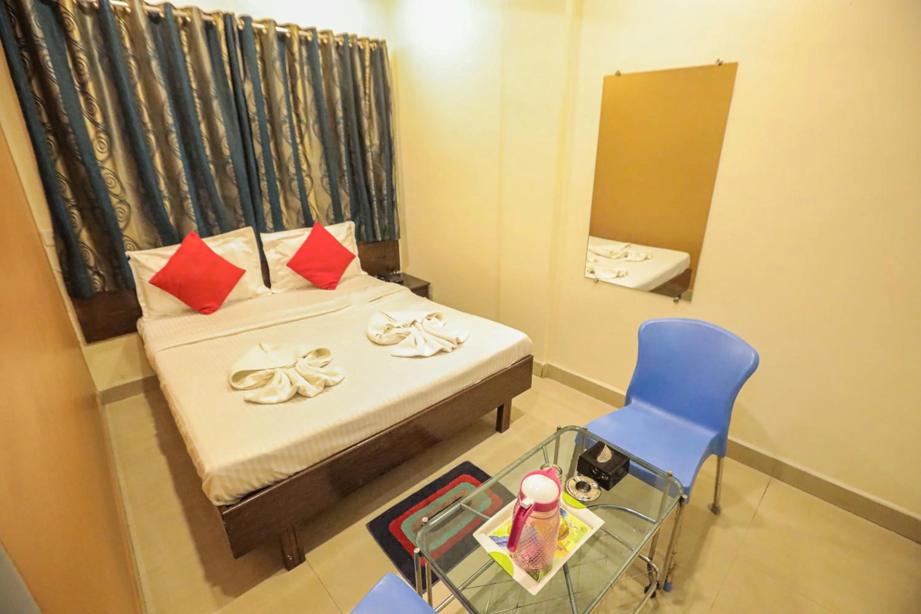 Photo of the whole room, Bed in Hotel Sai Niwas