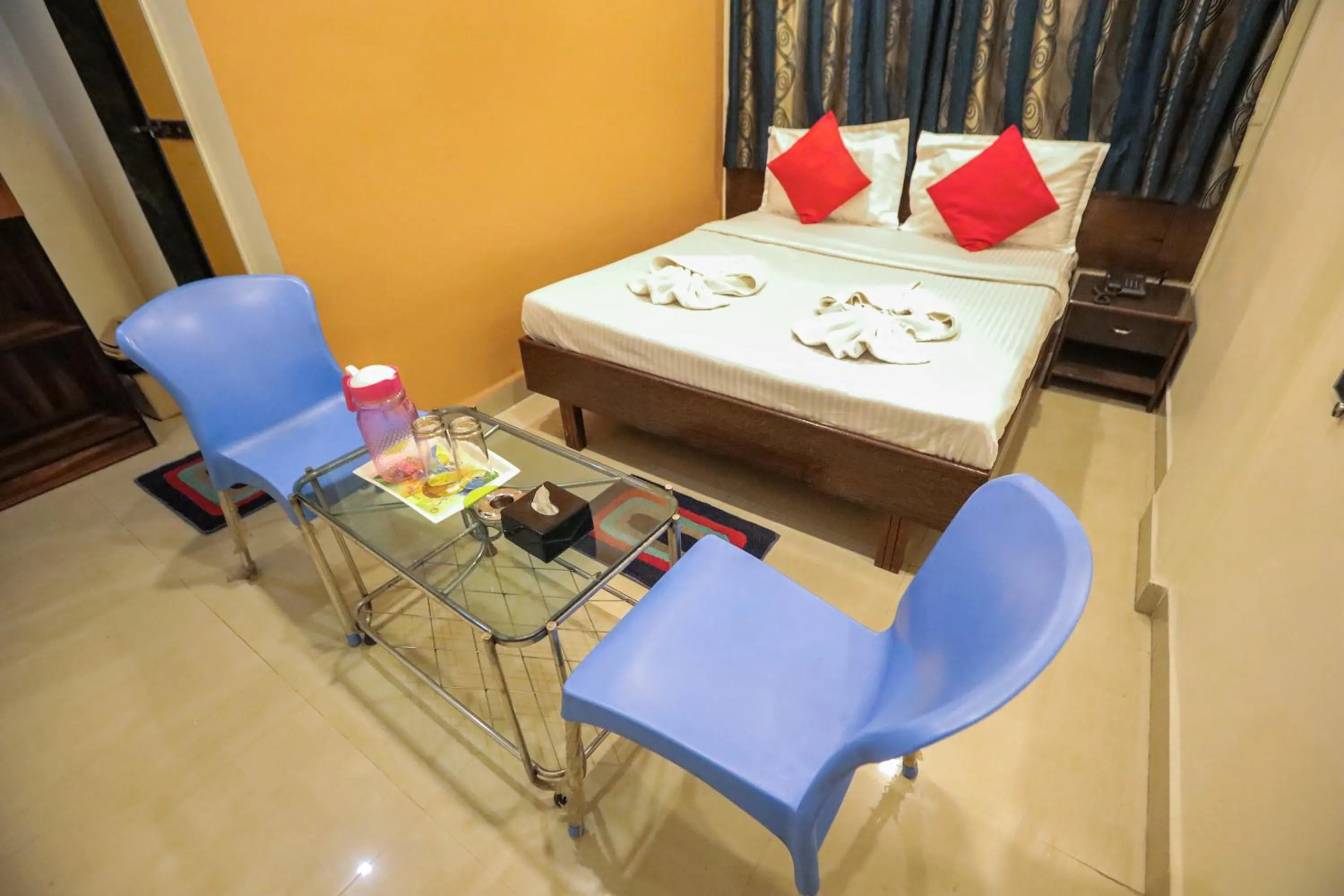 Bed in Hotel Sai Niwas