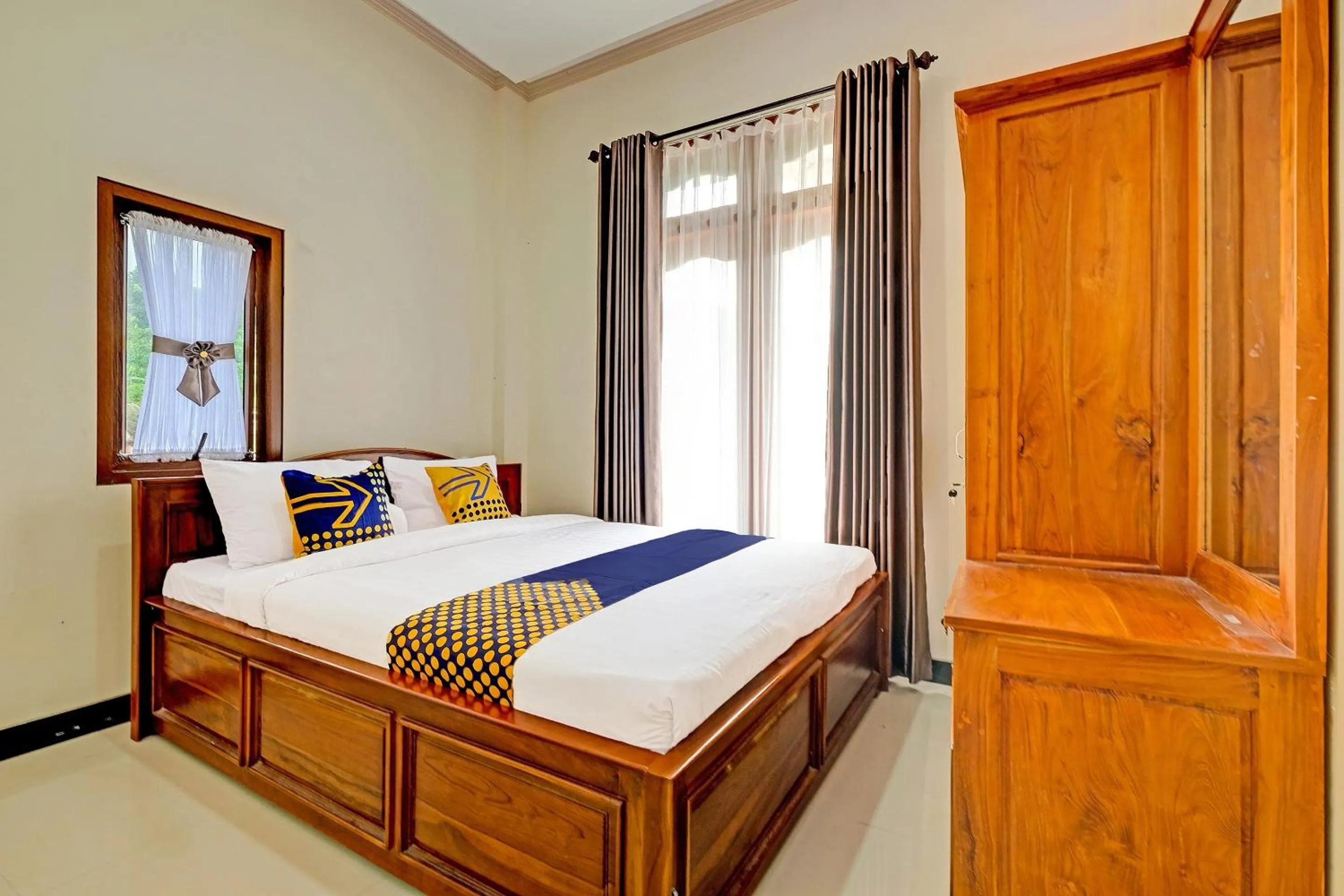 Bedroom in OYO Homes 91095 Desa Wisata Conto