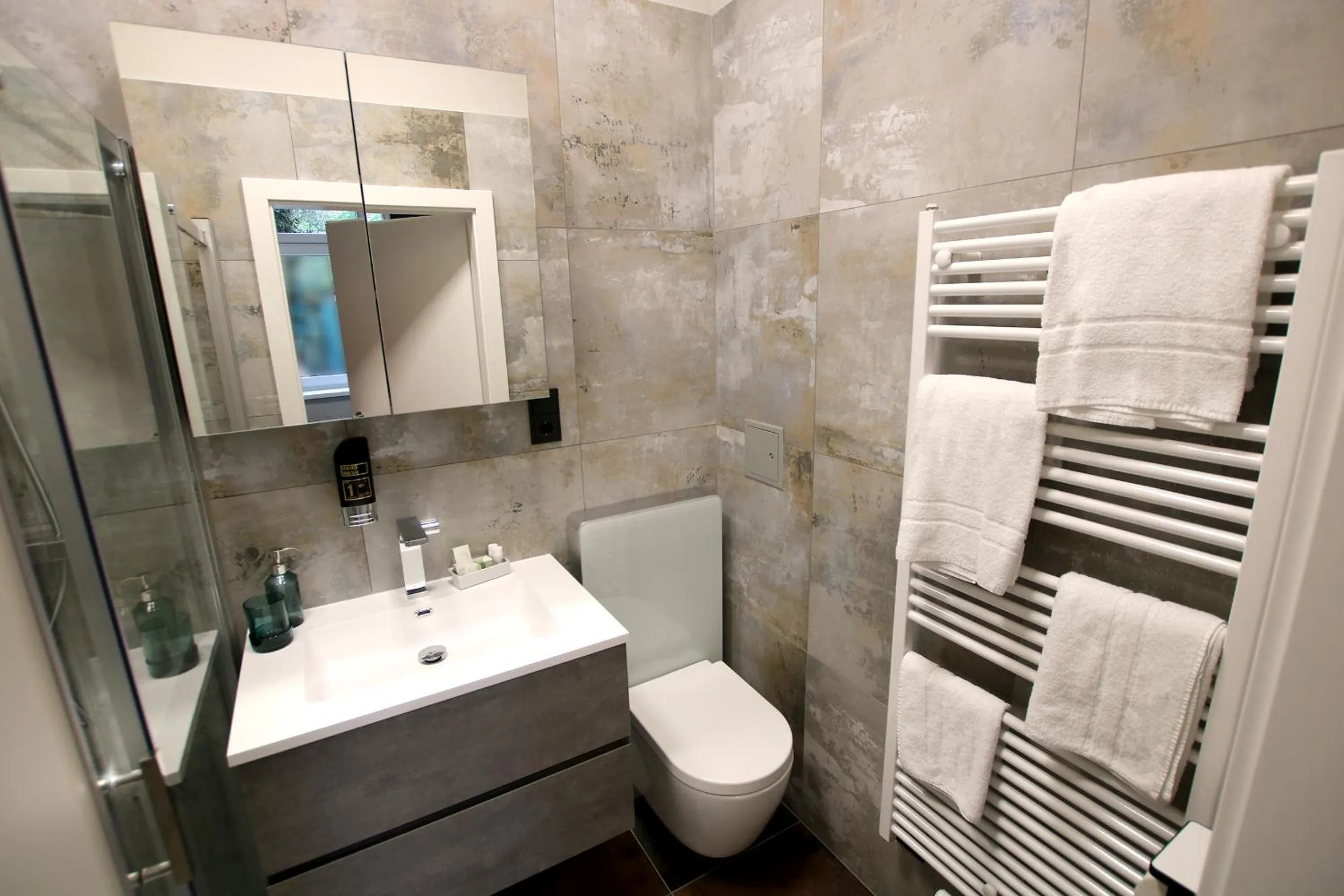 Toilet in Street Living Hotel - Apartments