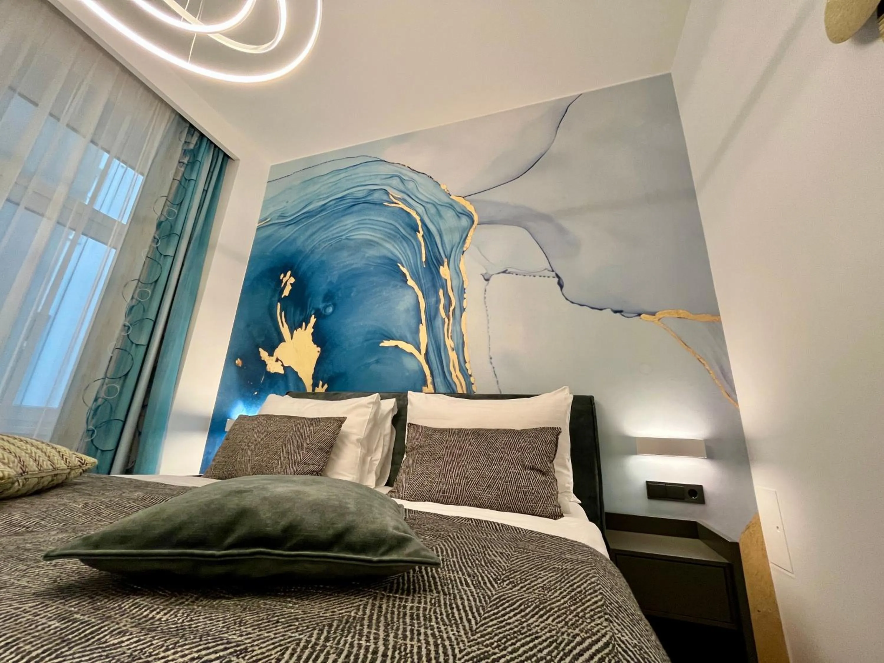 Bed in Street Living Hotel - Apartments